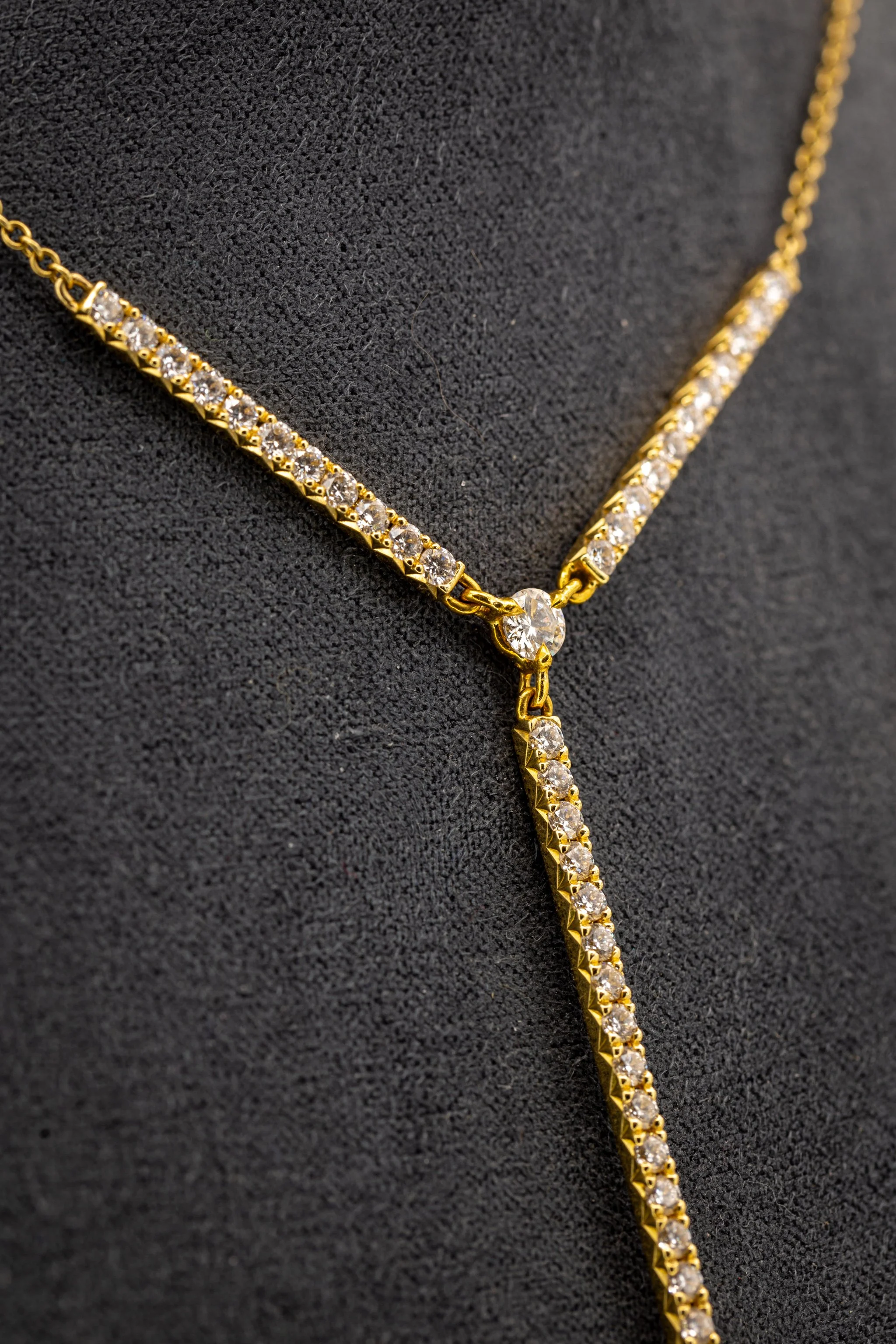 18k and natural diamond french fishtail station necklace on 18" adjustable cable chain