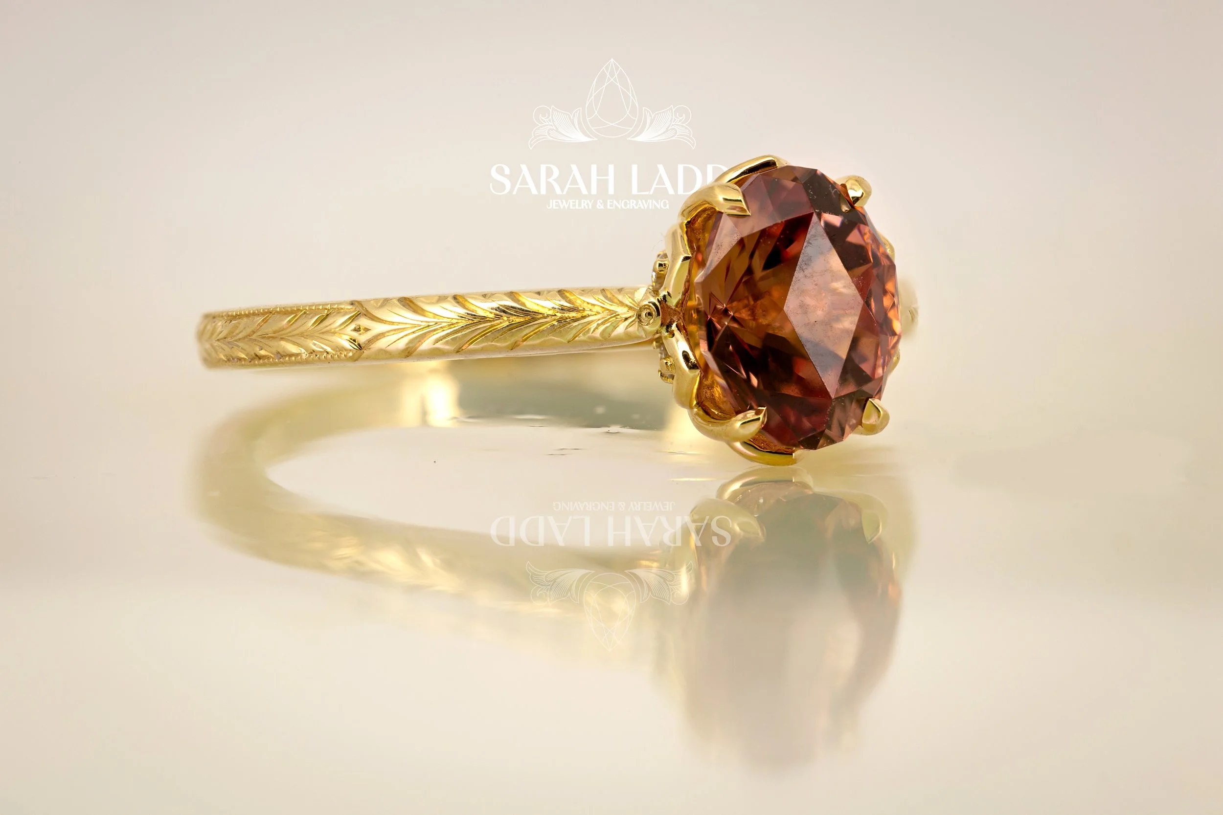 pink garnet solitaire waermark1.jpg