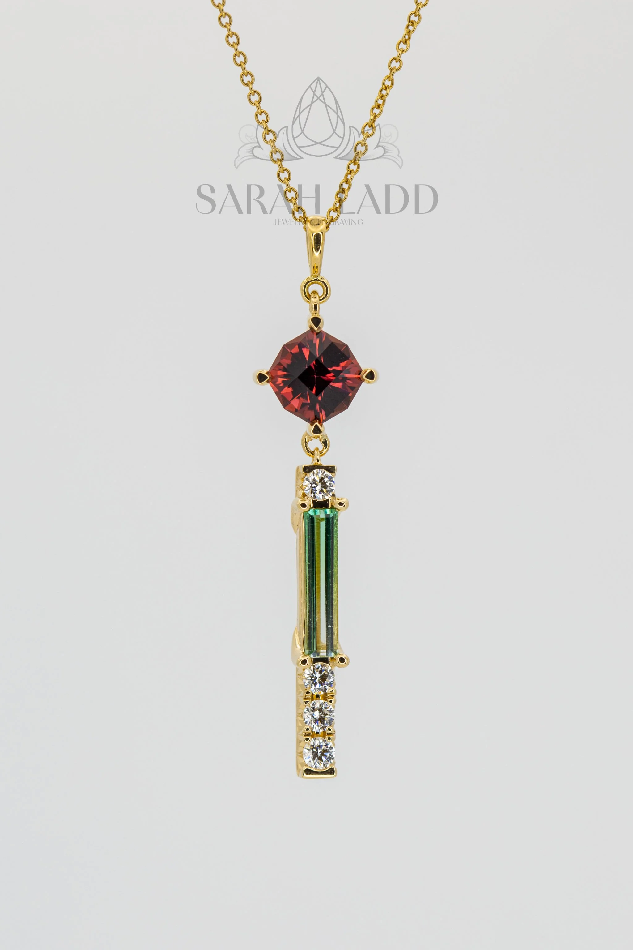 "Speakeasy Queen"
18k yellow gold featuring 1.2 carat Zambian rubellite tourmaline custom cut by Canadian lapidary artist Matthew Slade and .61 carat mint bicolor Afghan tourmaline, accented with VS1 G natural earth diamonds.