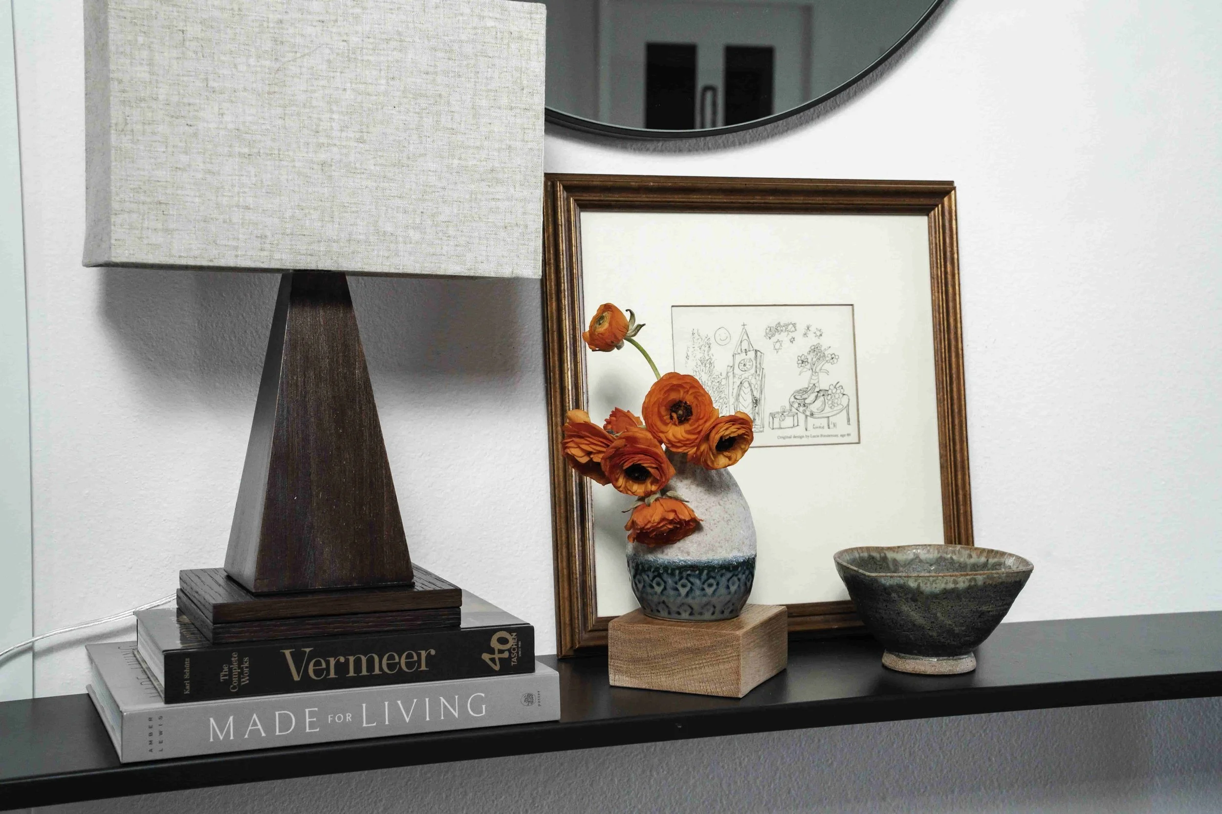 Stoneware vase with orange ranunculus.jpg