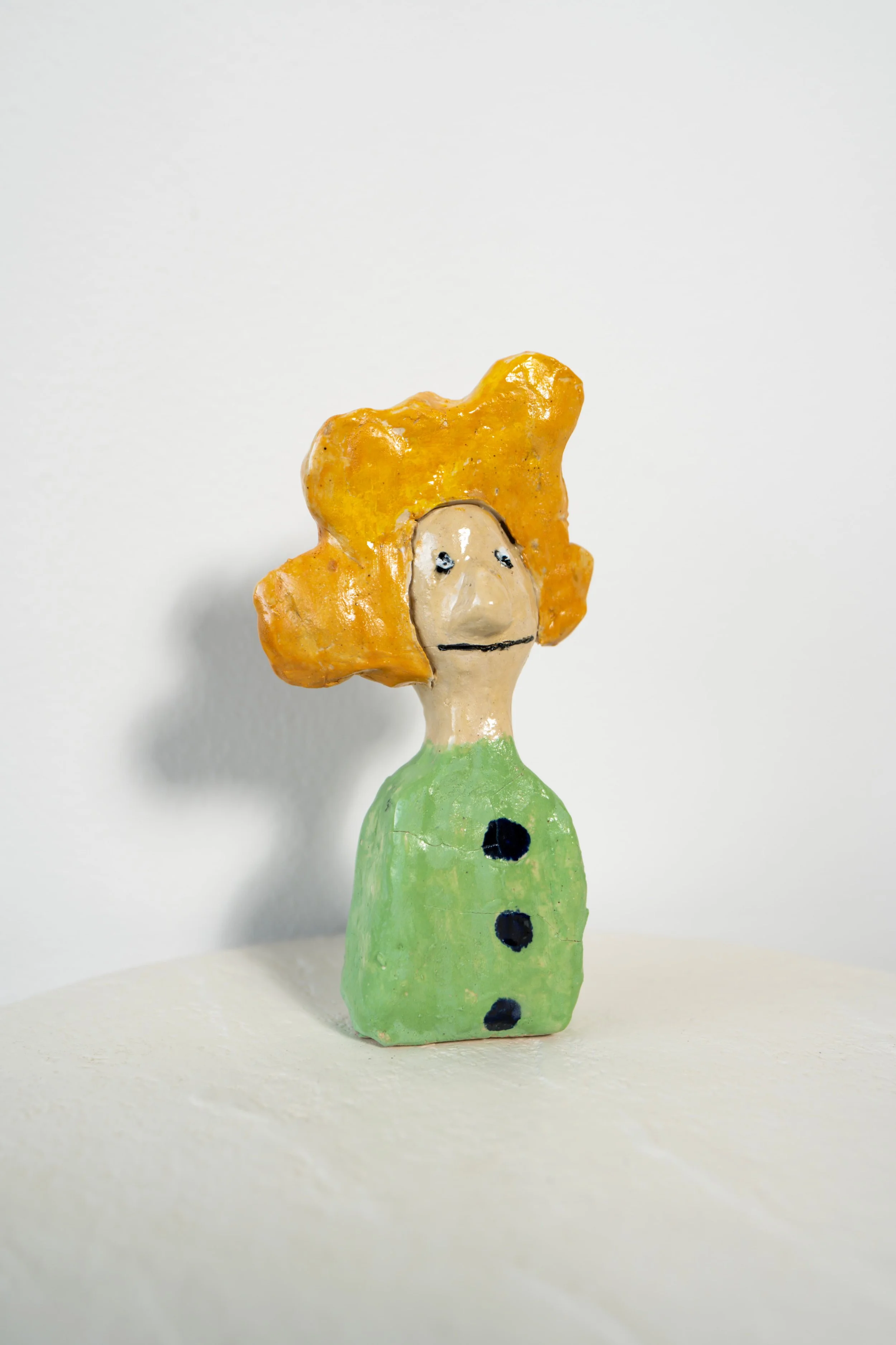 “Woman in Green” Ceramic Figure