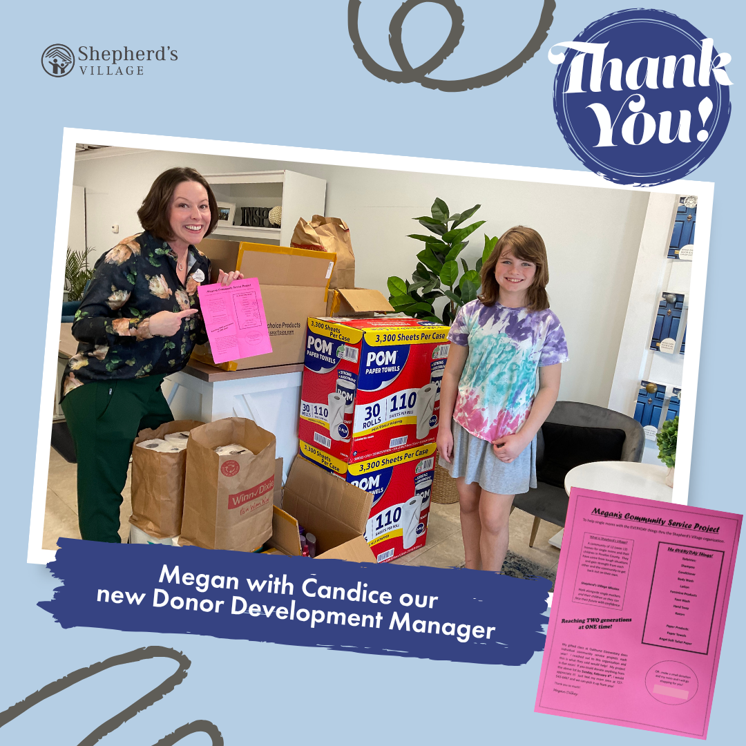 A woman and a young girl standing next to a large box of paper towels, surrounded by boxes and bags of supplies in an indoor setting. The woman is smiling and holding a pink paper, and the girl is also smiling. The image includes the logos for Shepherd's Village and a thank you message, with a pink poster and some decorative black swirls on a light blue background.