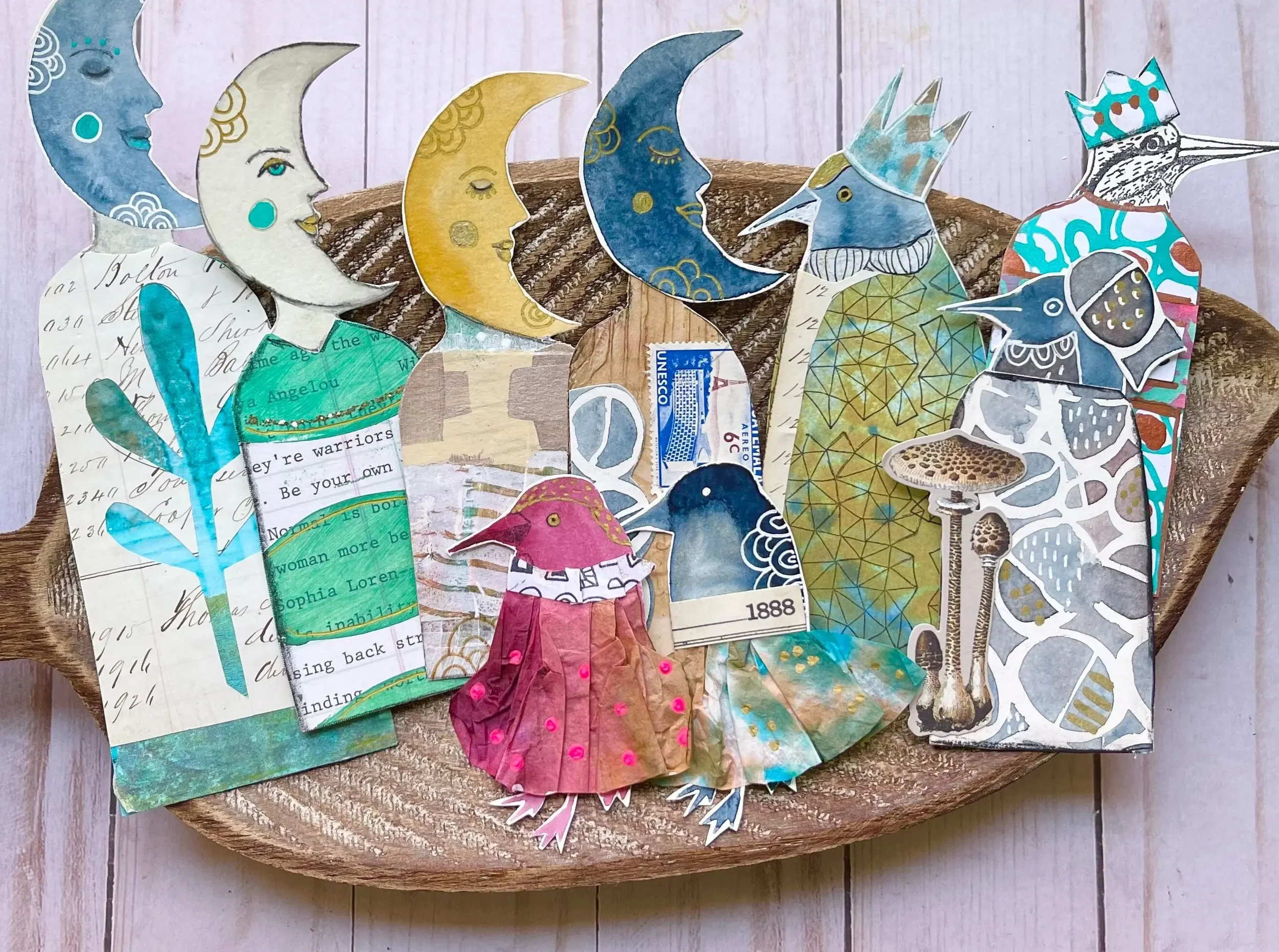 more unique paper dolls in a wooden bowl