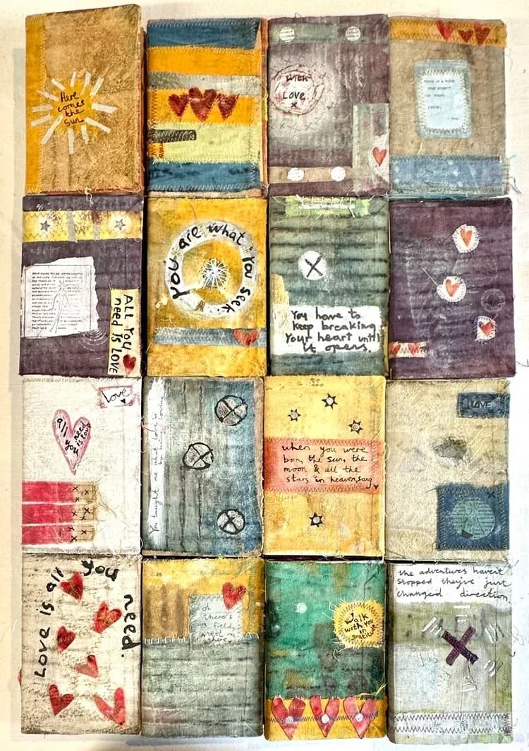 Collection of all handmade books covers facing up
