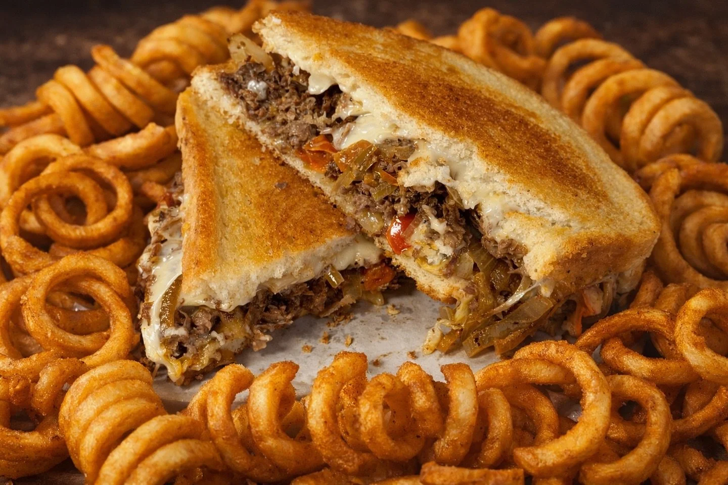 Drippy. Melty. Built different. 🧀🔥
Our Philly melt stacks shaved steak, saut&eacute;ed peppers, American cheese, and our signature house Meltdown Sauce&mdash;pressed golden and served loud. One bite and it&rsquo;s over.

Tag the friend who&rsquo;s 