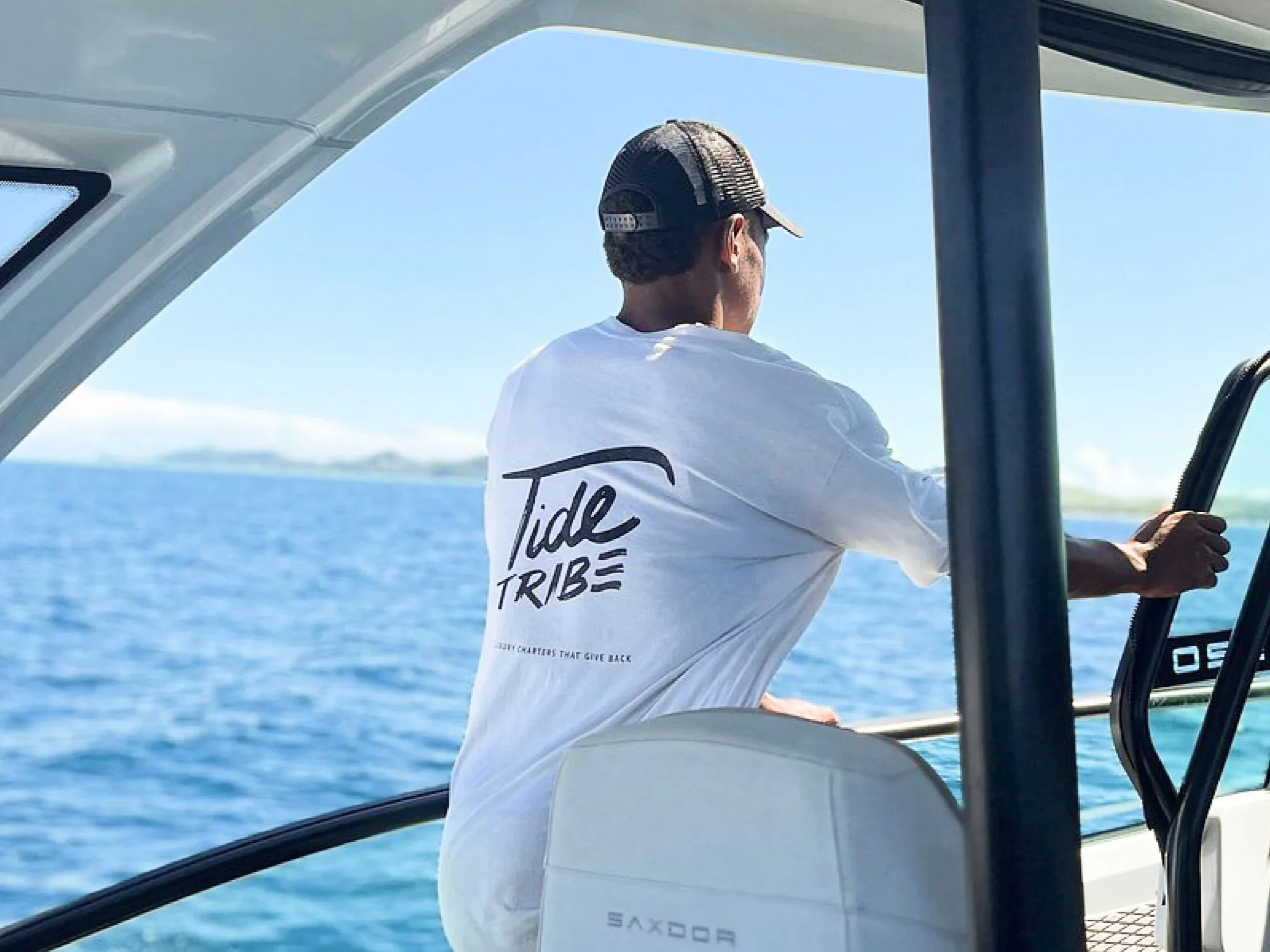 Tide Tribe's rugged logo applied to shirts