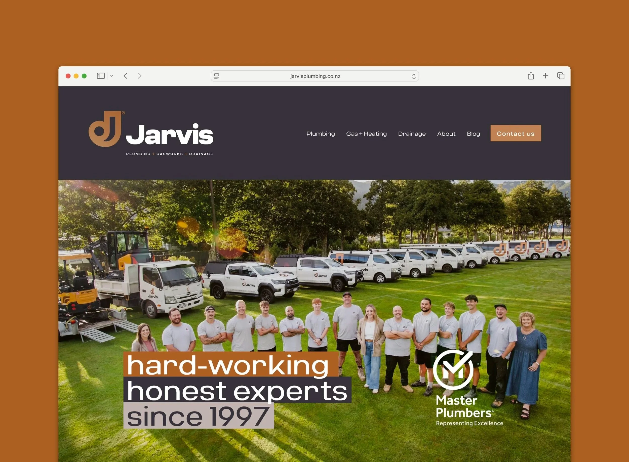 Website for a plumbing company called Jarvis, the main image shows the team standing on the grass in front of their vehicle fleet.