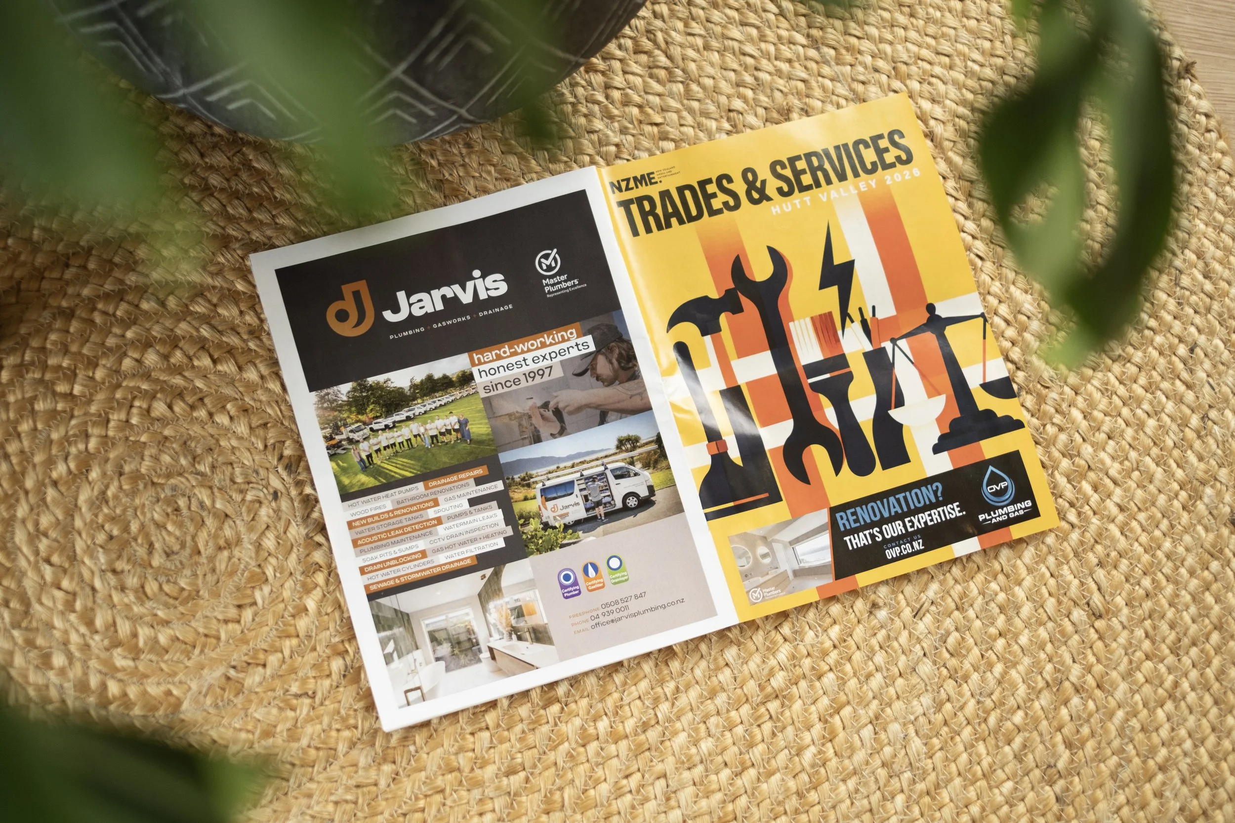 Full-page ad for Jarvis Plumbing on the back of the Trades & Services magazine