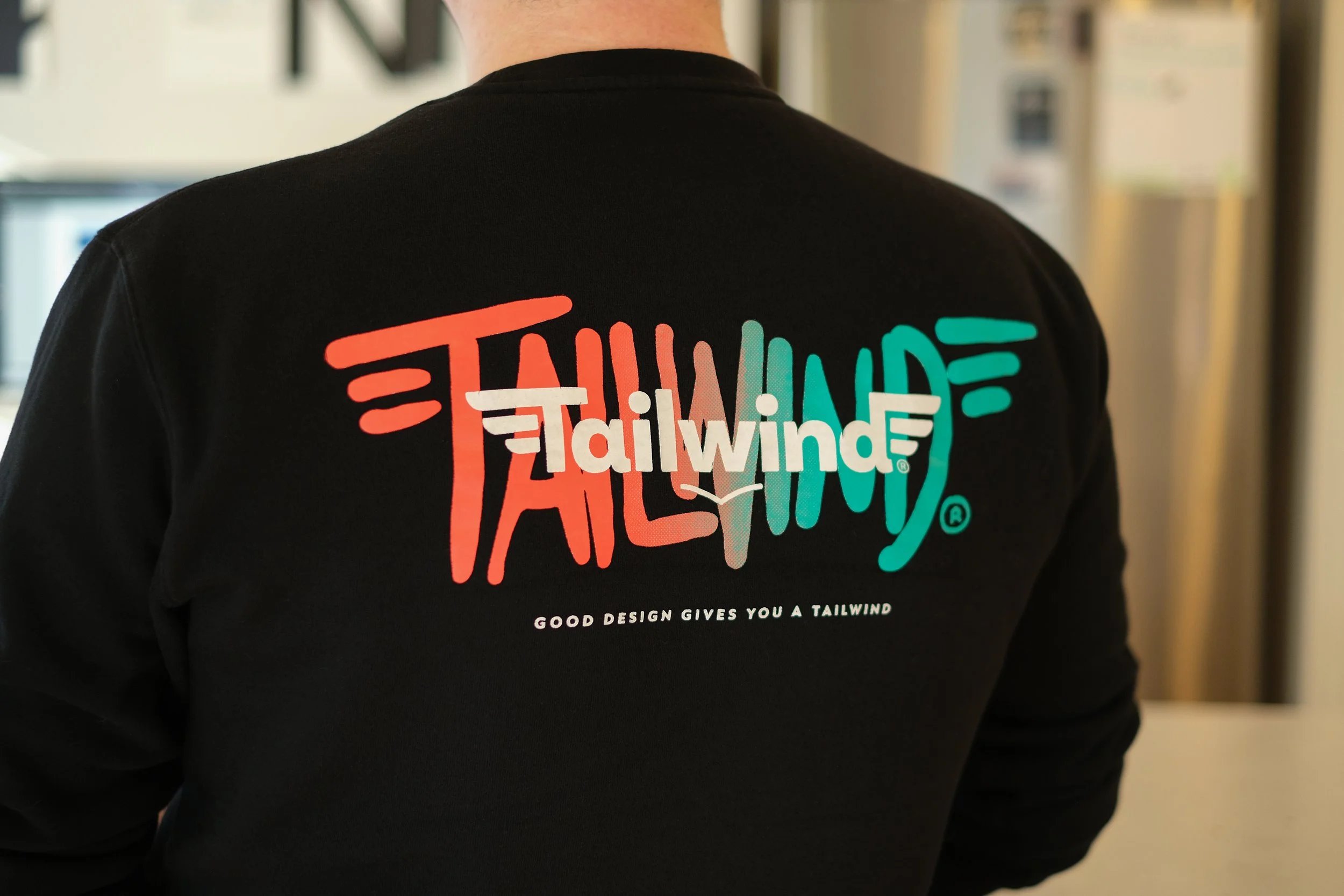 Customised graffiti-like logo for Tailwind apparel