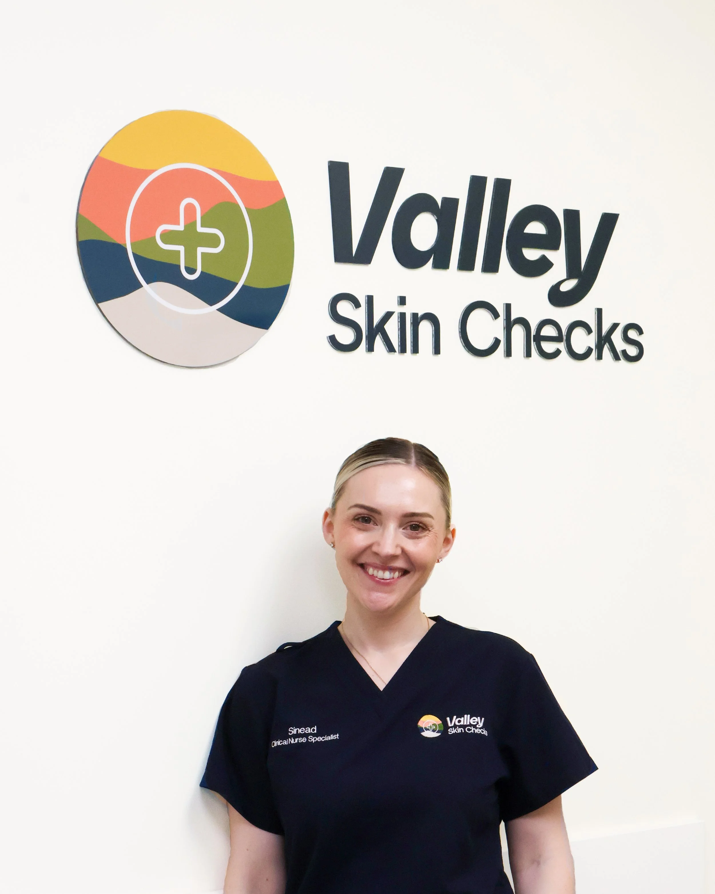 Owner of Valley Skin Checks Sinead Dean proud of her new clinic and new branding done by Tailwind Branding and Design