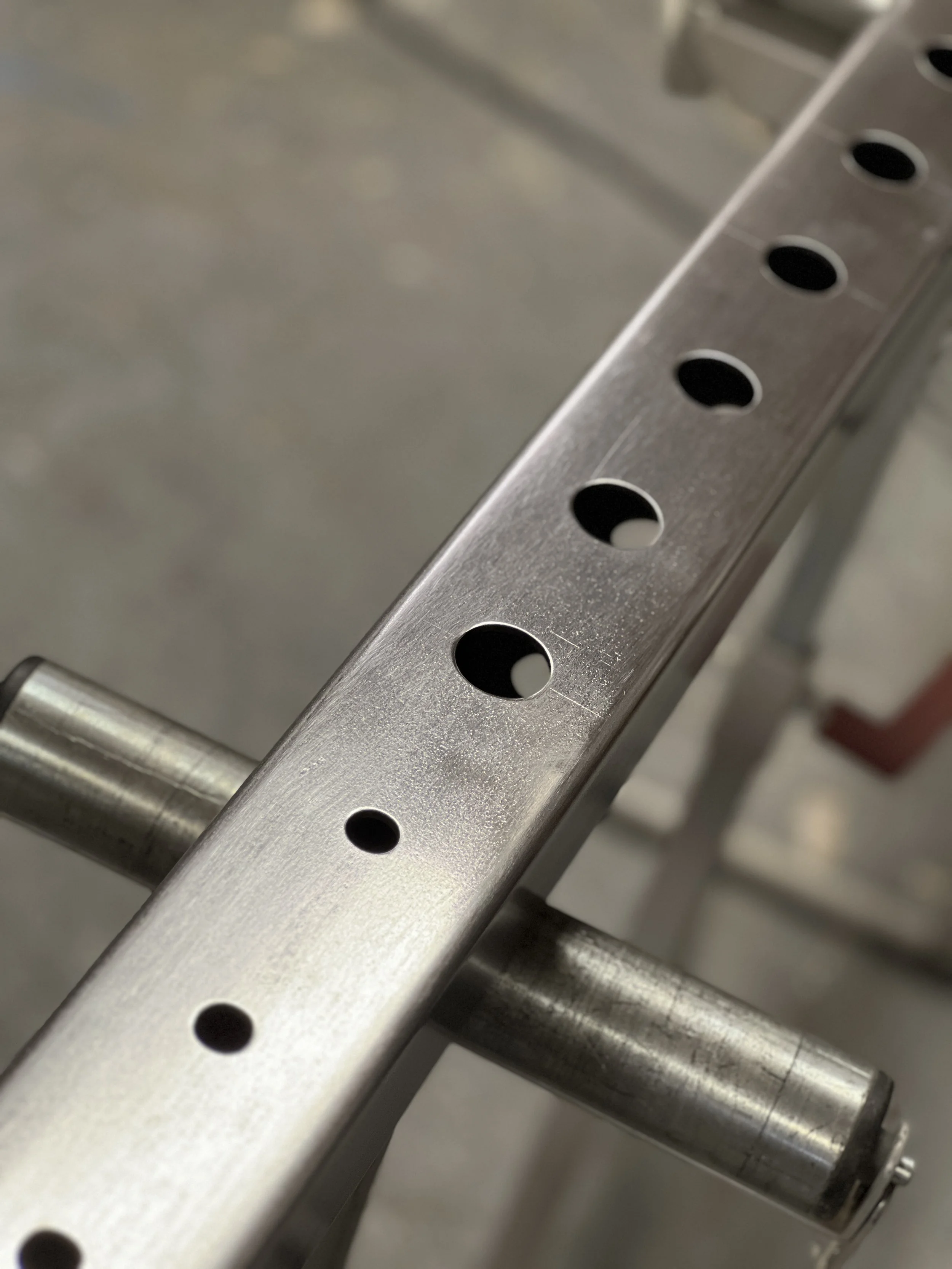 A Squat Rack Upright manufactured in-house to match a custom aesthetic