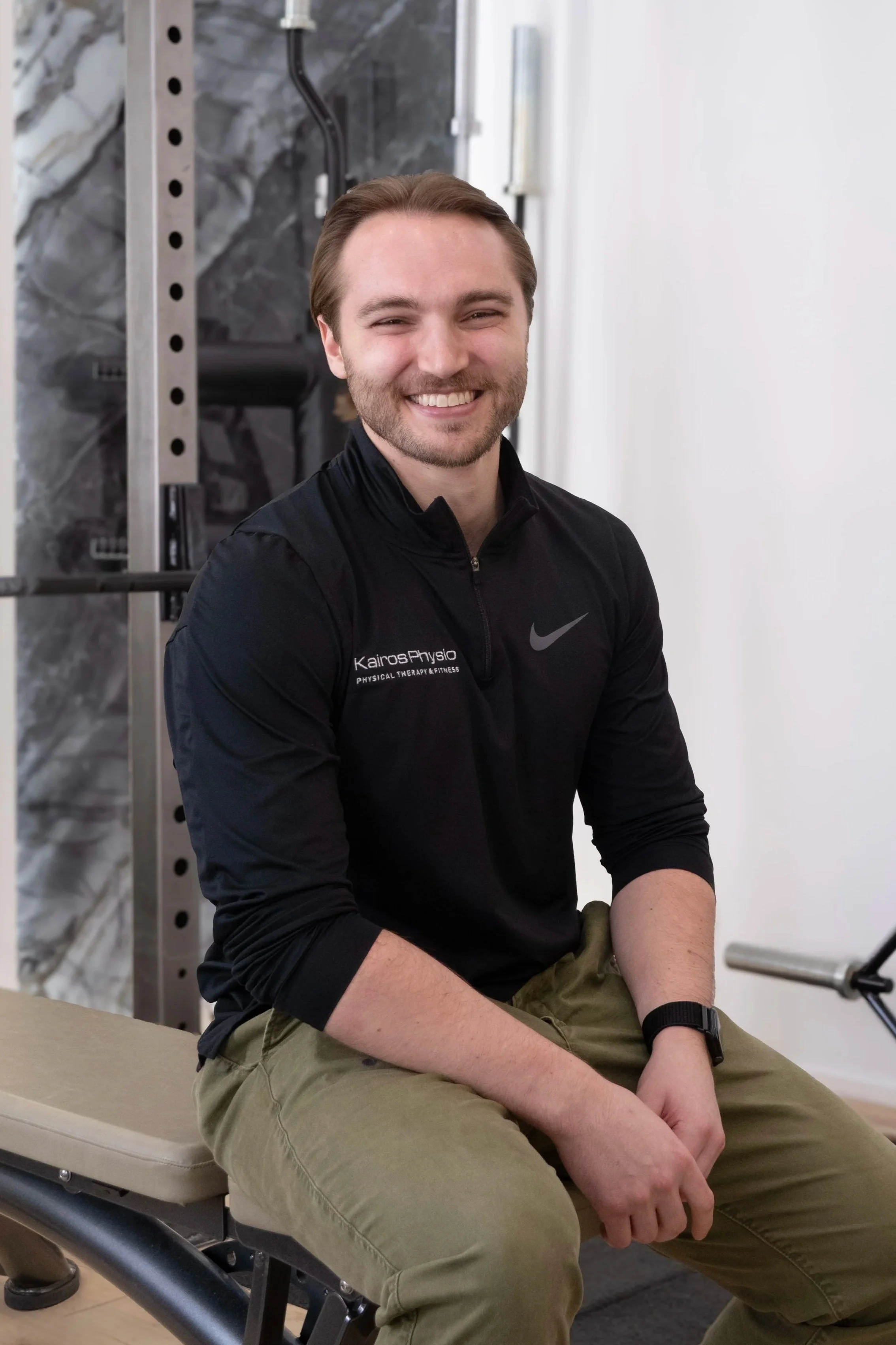 This is a portrait of Dr. Jesse Slevin, Orthopedic Clinical Specialist, Physical Therapist, and Founding Member of Kairos Physio.