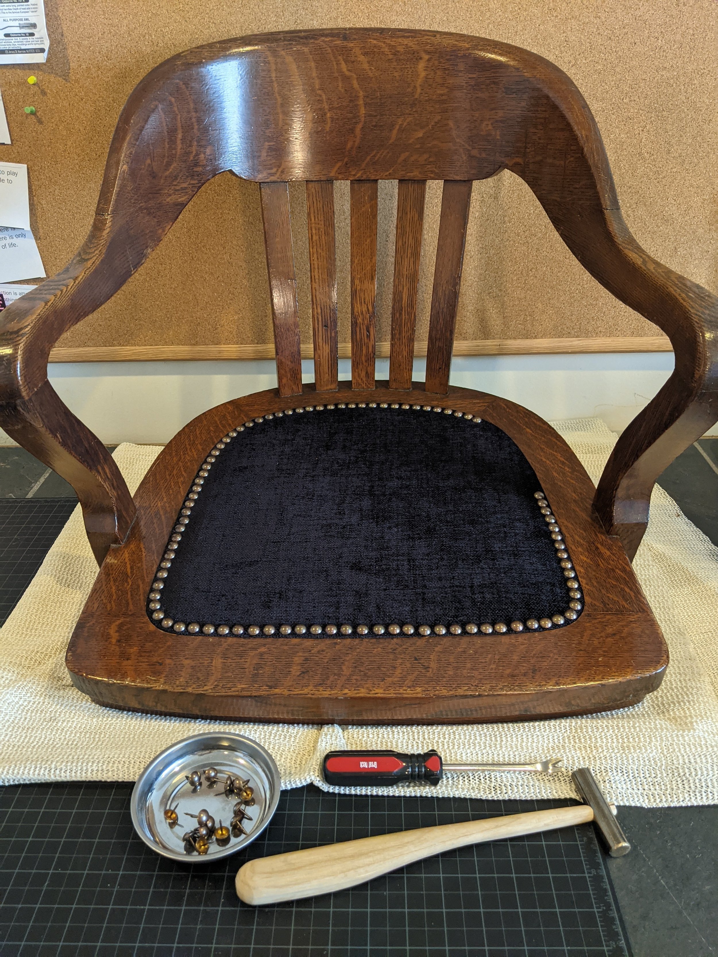99 bronze nail heads were needed to complete the trim