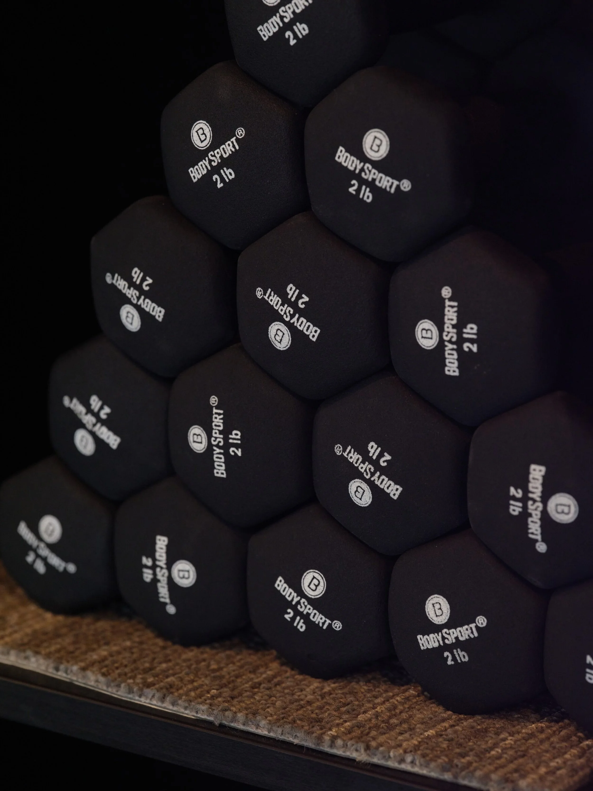 There is something so satisfying about perfectly stacked weights. 👏What is your favorite prop to use in class? Are you a loop fan? Crazy for ankle weights? Let us know!