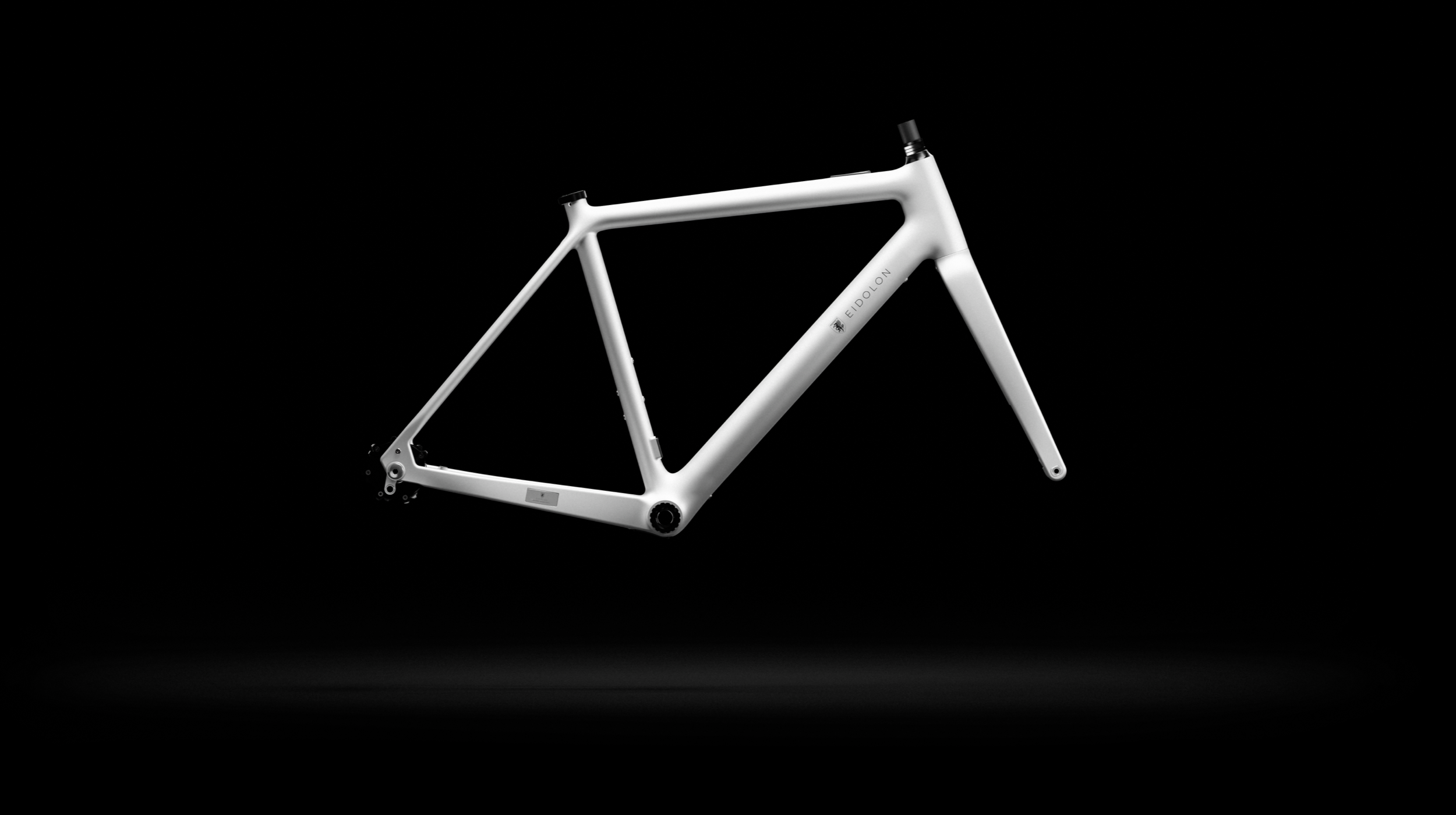 Ponomarets EIDOLON eBike Frameset in White against a black background.