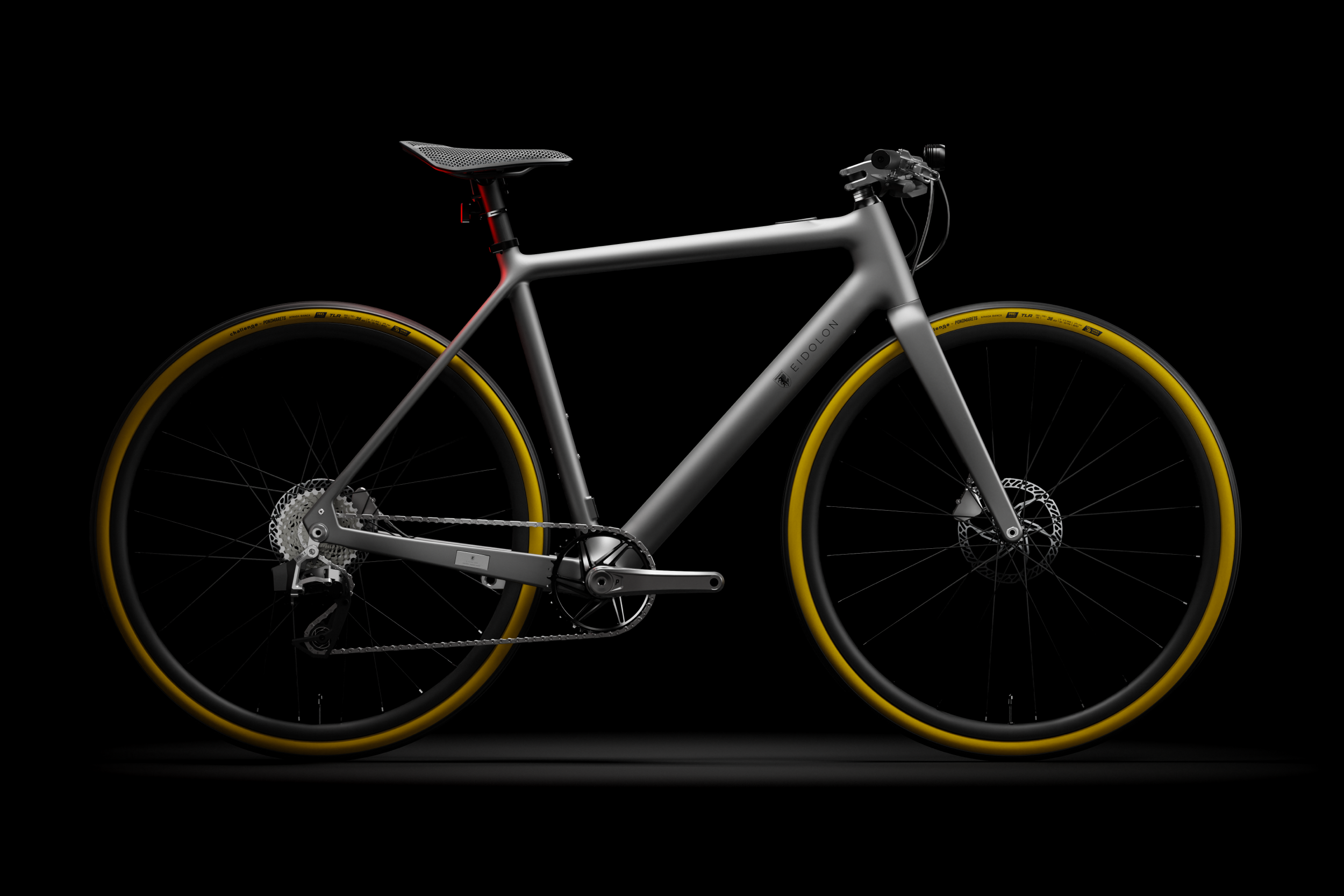 Ponomarets EIDOLON eBike finished in Platinum Silver  under a spotlight against a black background.
