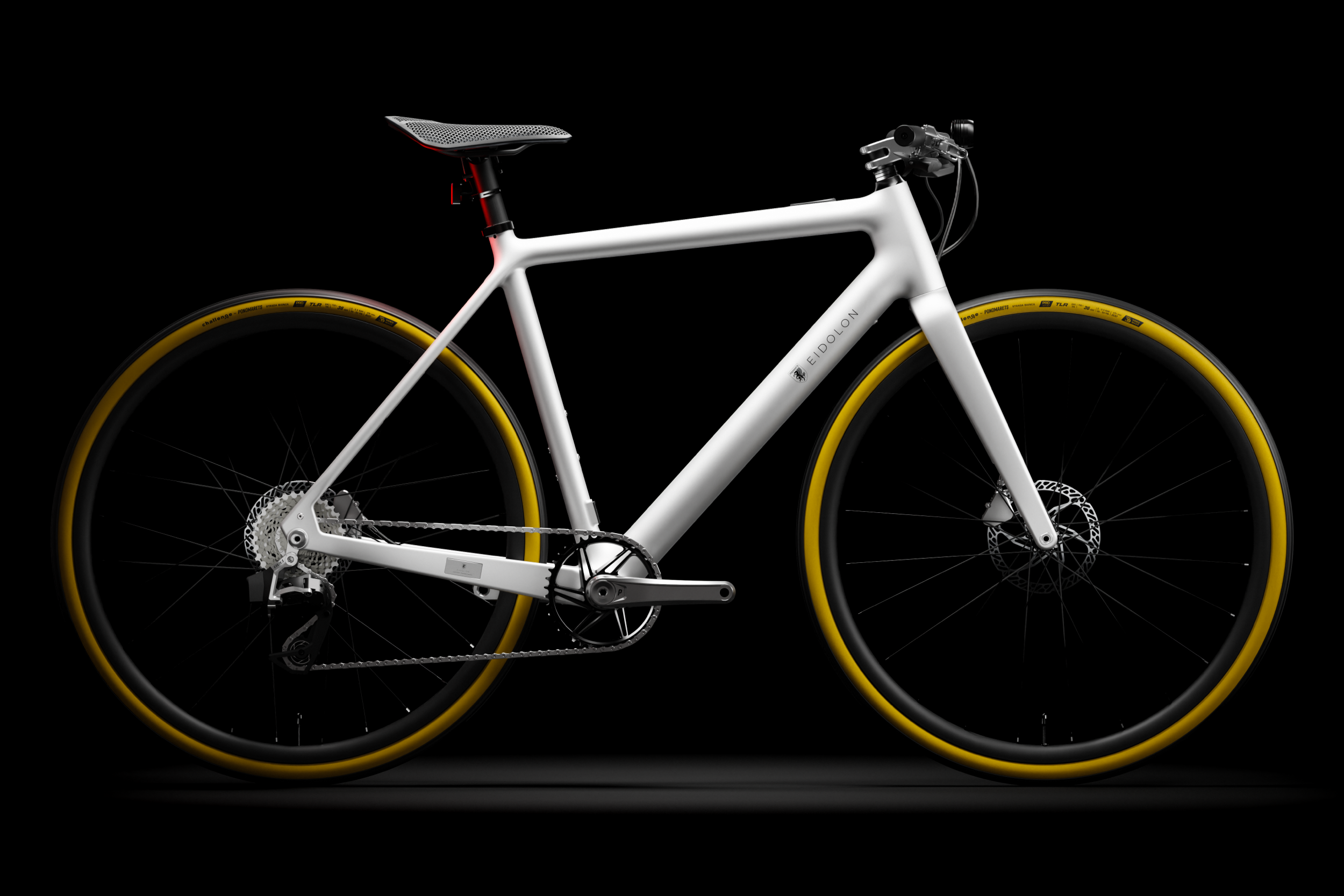 White Ponomarets EIDOLON eBike under a spotlight against a black background.
