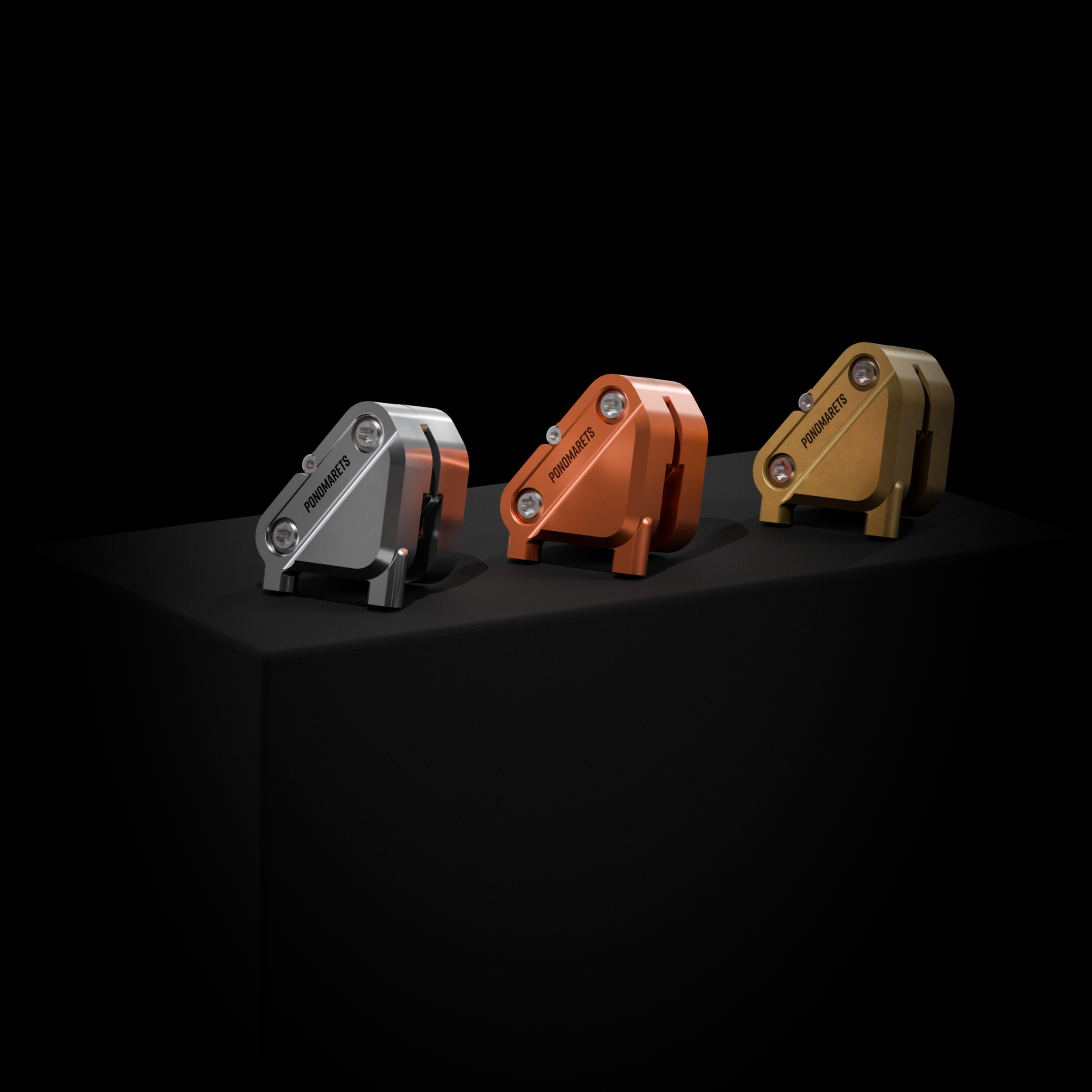 Ponomarets EIDOLON precision brake callipers in silver, copper and brass finishes, displayed on black pedestals against a dark background.