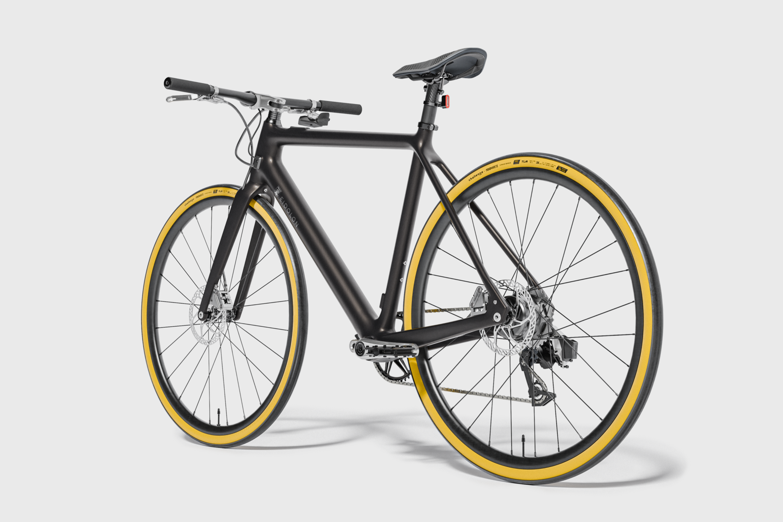 Ponomarets EIDOLON eBike finished in UD-carbon against a light background.