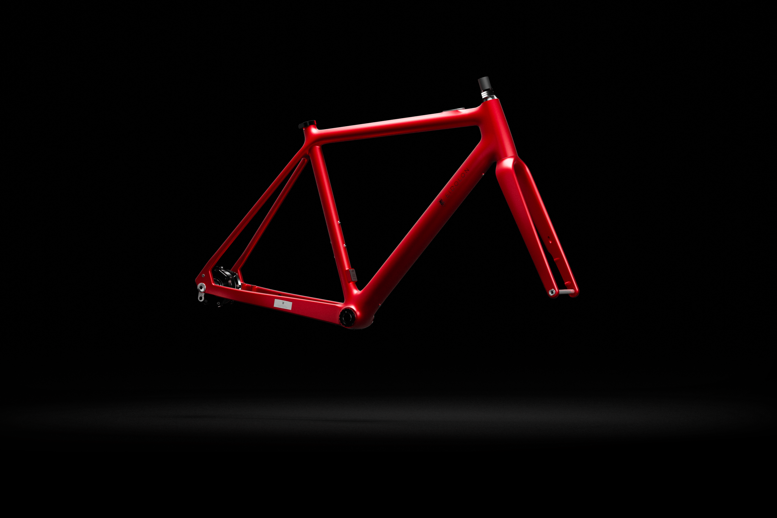 Red Ponomarets EIDOLON eBike Frameset against a black background.