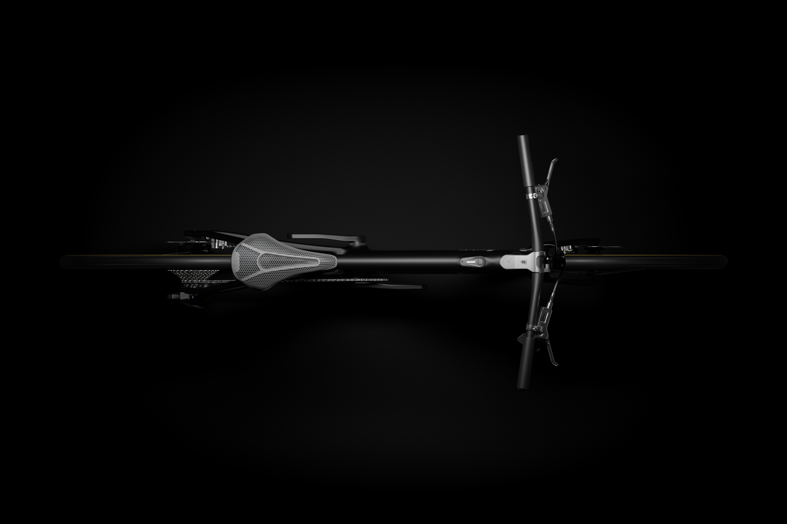 Jet Black Ponomarets EIDOLON eBike under a spotlight against a black background.