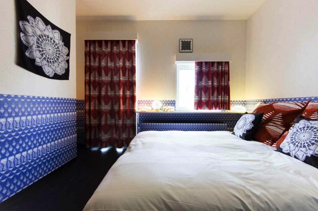 MODEZ HOTEL. Vonk designed the curtains, pillows, the paneling, the lamp, window covering, a diversity of art pieces and wardrobe hangers.