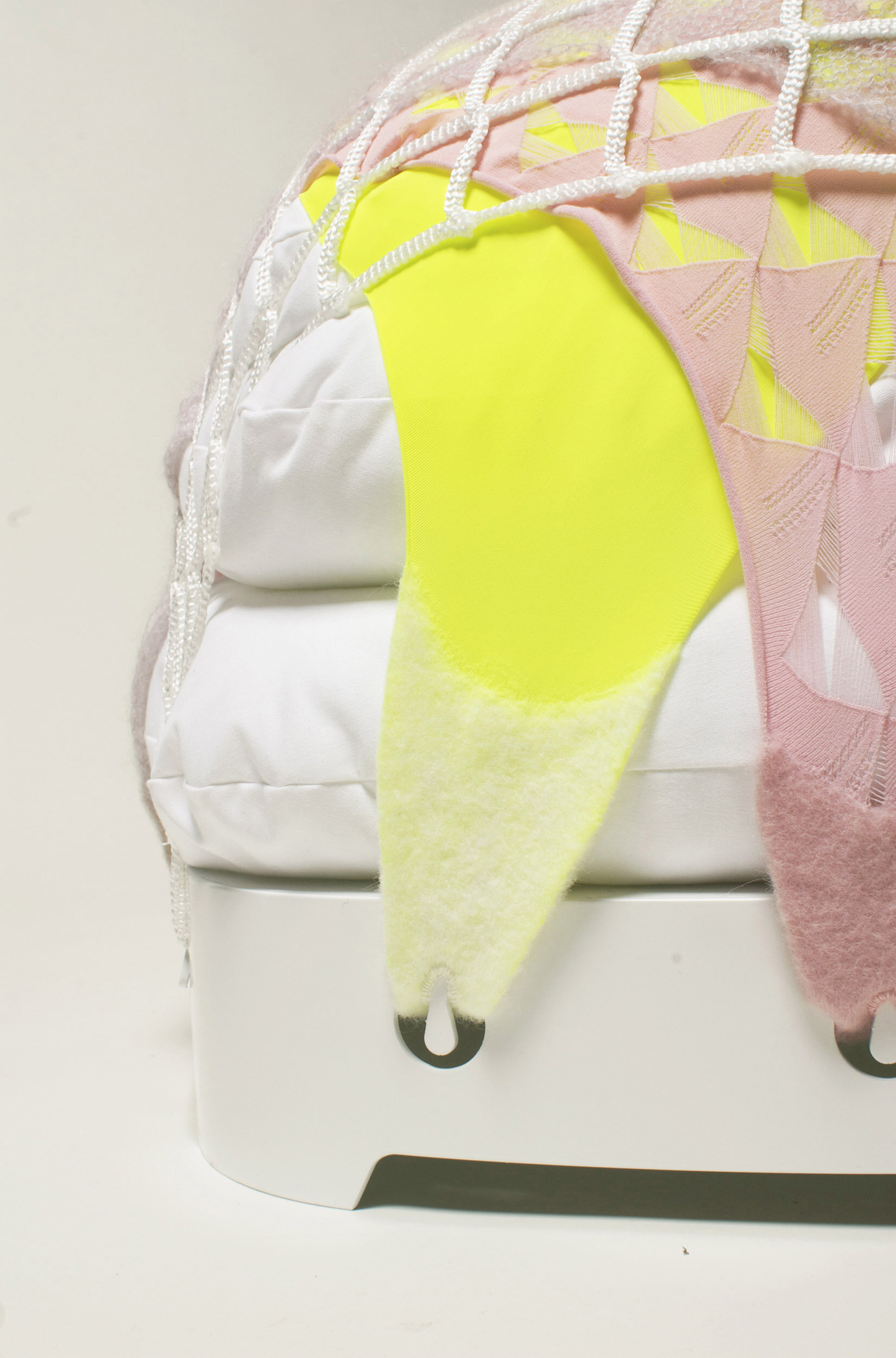 The combination of elastic nylon, hairy mohair and shiny swimsuit fabrics