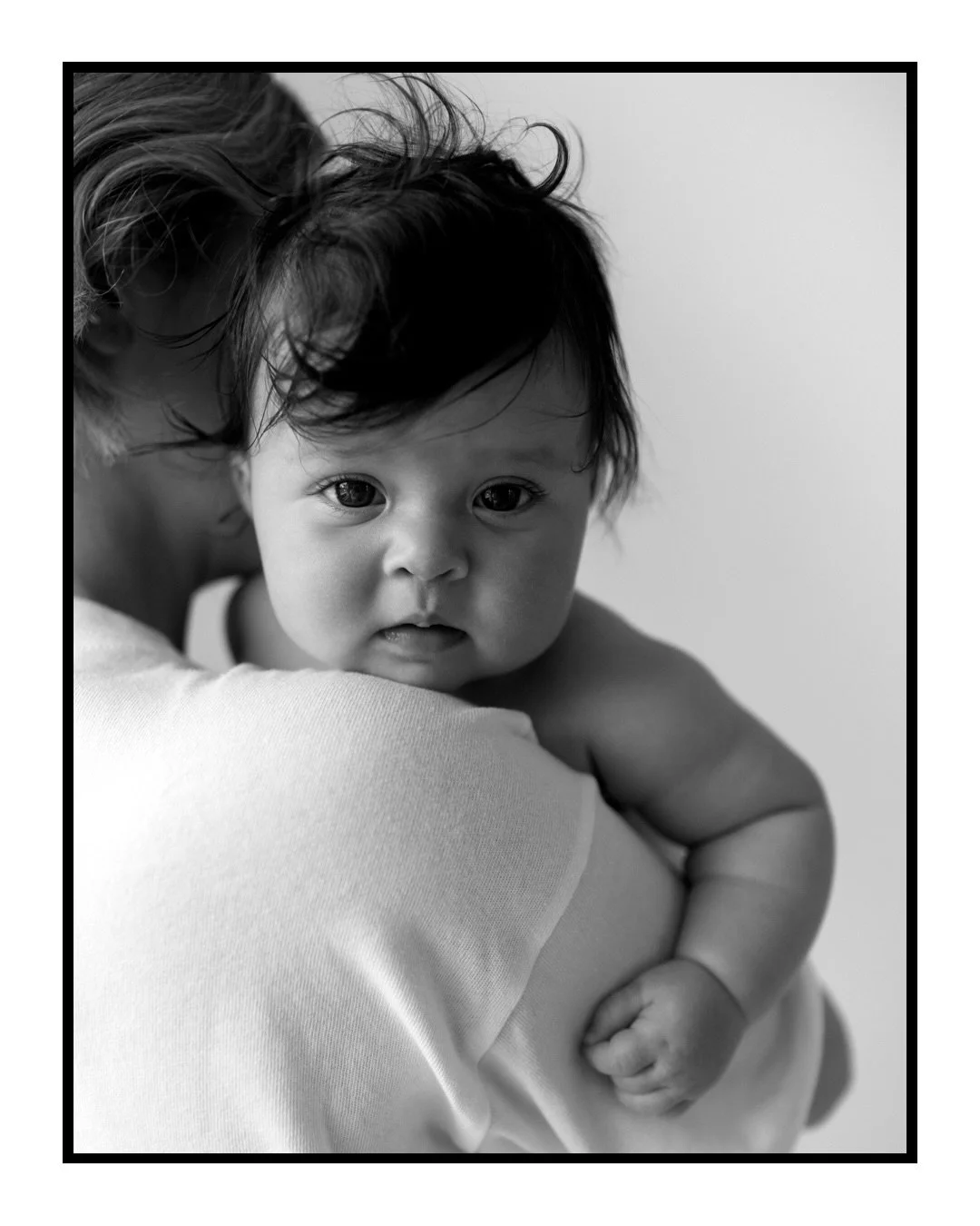 The feeling of their full body weight gently sinking into you as they fall asleep, the way their entire body fits on your chest and in your arms - a mother knows.
