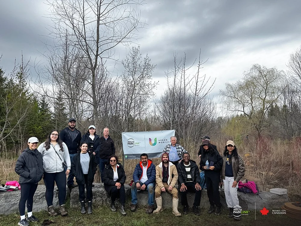 A group of Precise ParkLink employees at tree planting