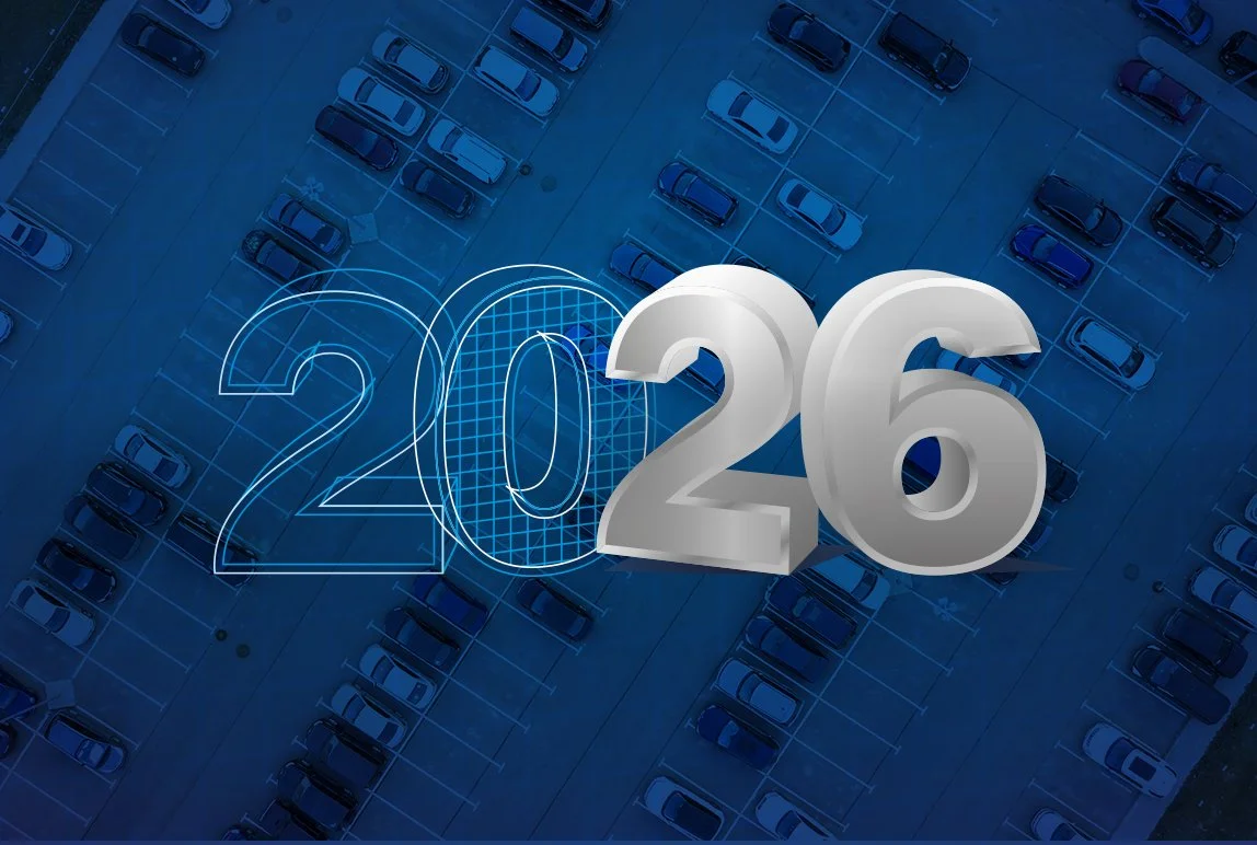 Areal parking lot with navey blue overlay and large "2026" in the center