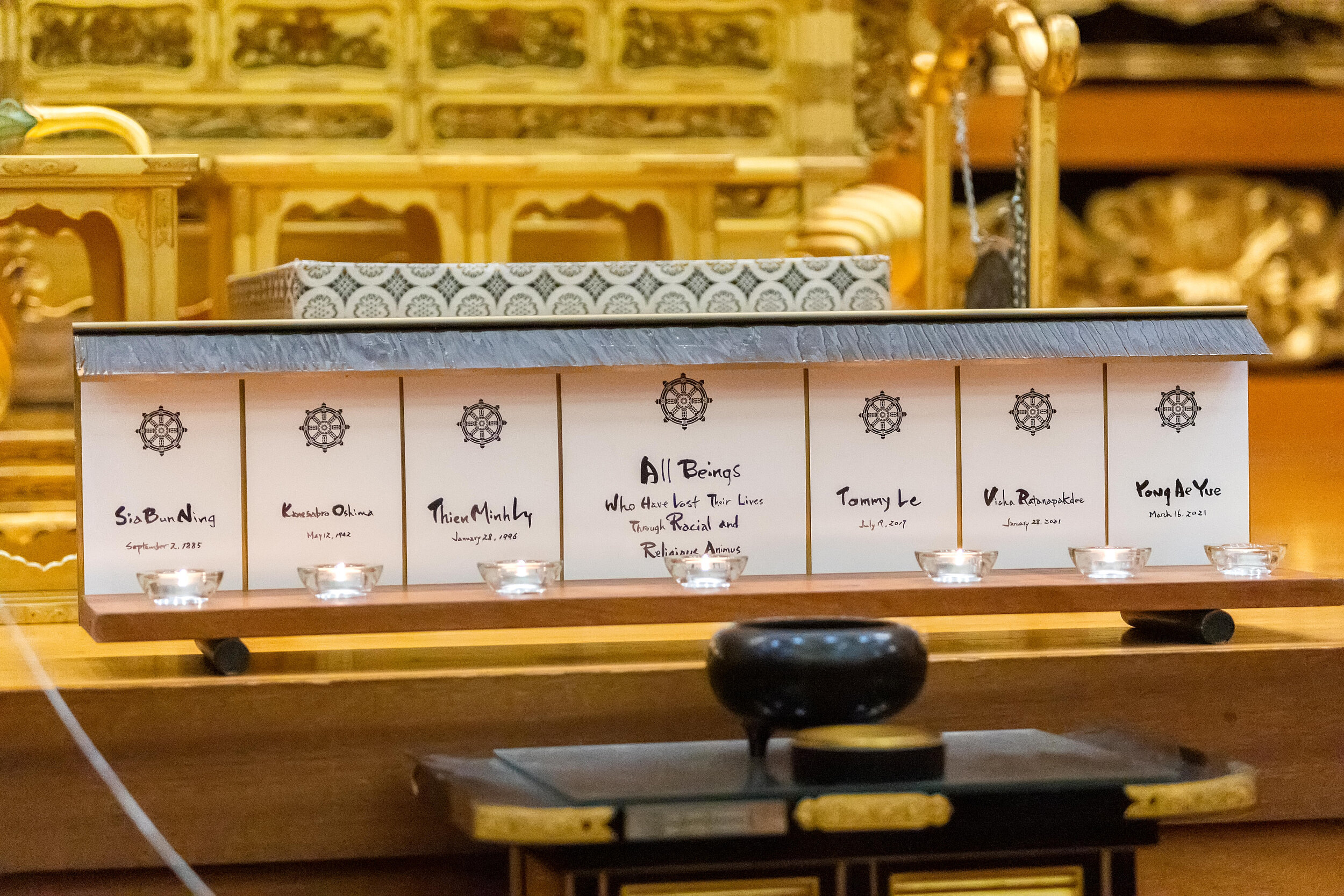 Seven memorial tablets at the altar