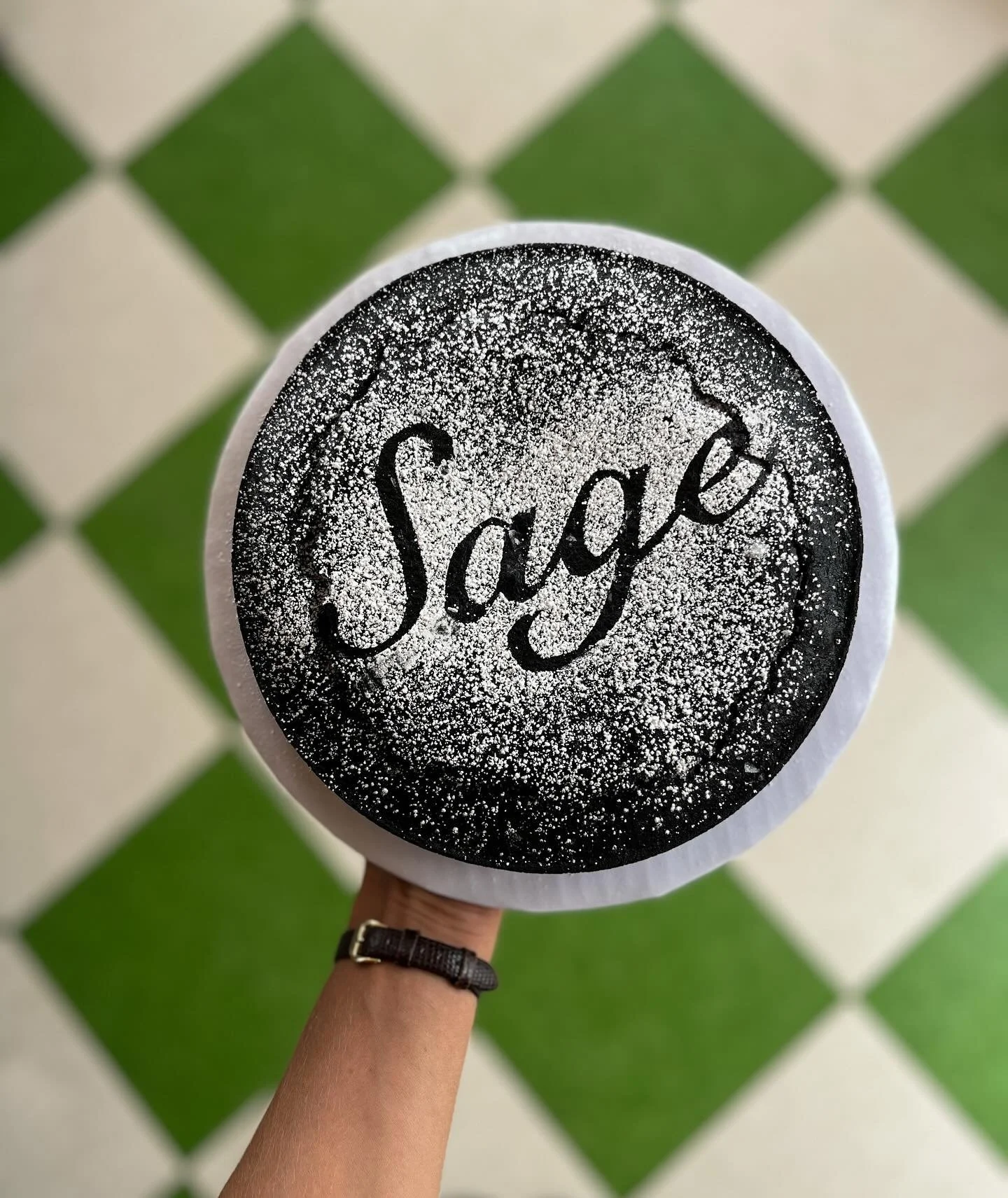 cutting out a stencil &gt; writing on a cake. Happy early birthday to a brother from another mother, SAGE @octopied 🤎🤎🤎black cocoa, black sesame evoo almond cake, naturally GF, one hundred % fucked up level GOOD

#stencil #sage #blackcocoa #PICNIC