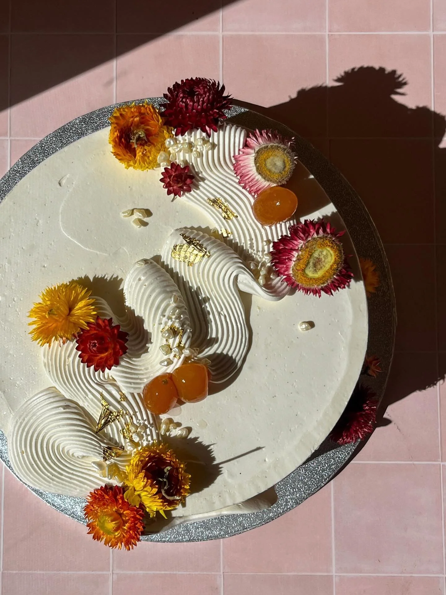when you&rsquo;re turning ✨13✨a bit of a magical cake is required YA KNOW🌸💕🍊vanilla chiffon, passionfruit wild mesquite curd and coconut streusel🎉

#birthdaycake #goldleaf #candiedkumquats #PICNICbakedgoods #pioneertown