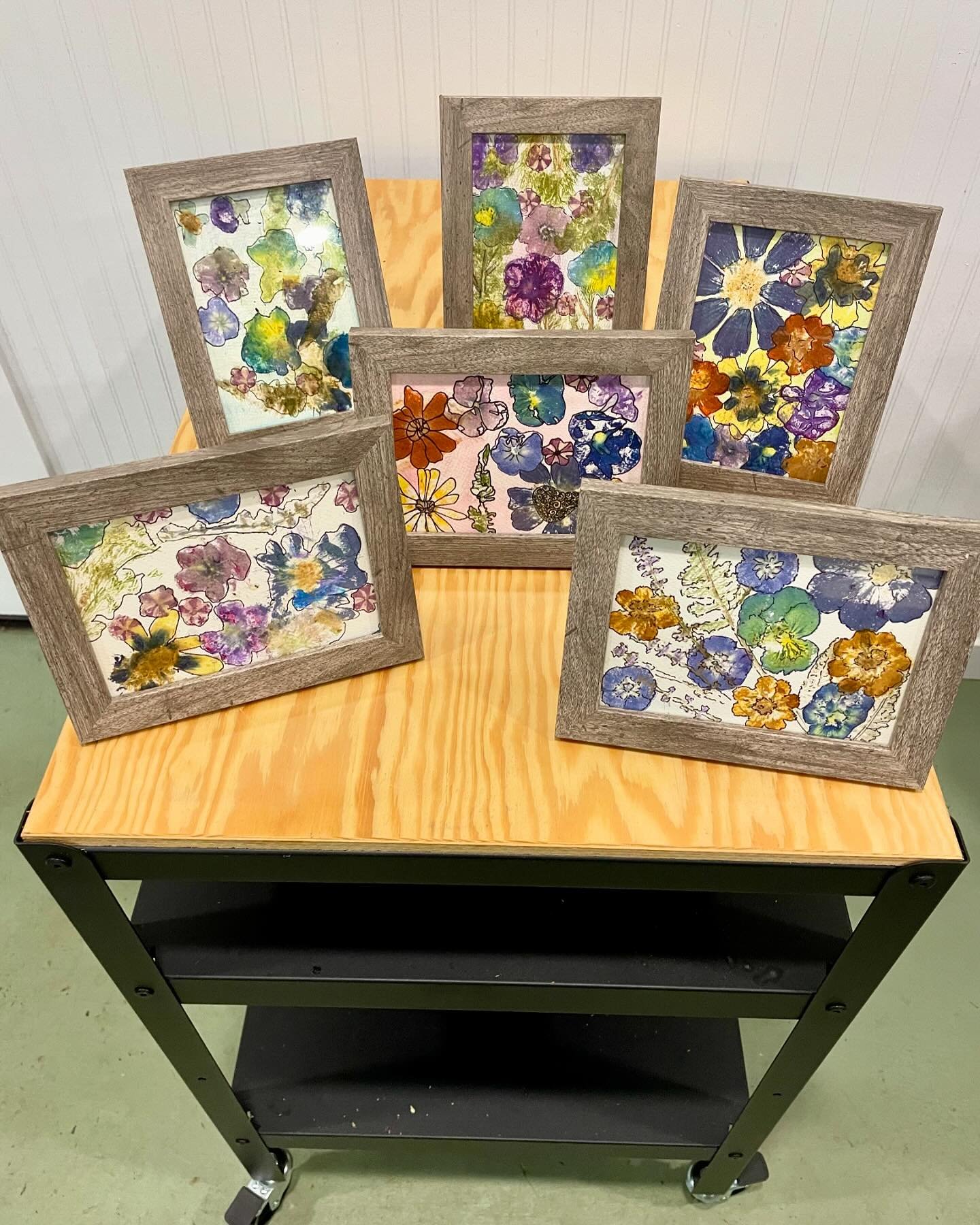I was happy to host members of a Girl Scout troop today for a flower pounding workshop. After a farm tour, we hammered flowers and greens onto watercolor paper and experimented with colors and shapes, using ink and watercolor to embellish the impress