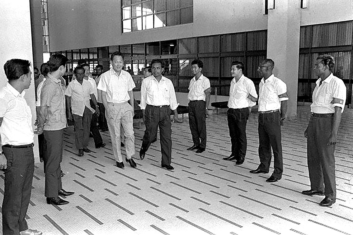 Mr Lee Kuan Yew at the SCHTUH for a trade union event. A patterned floor in mosaic tiles illustrates the quality workmanship that he extols.