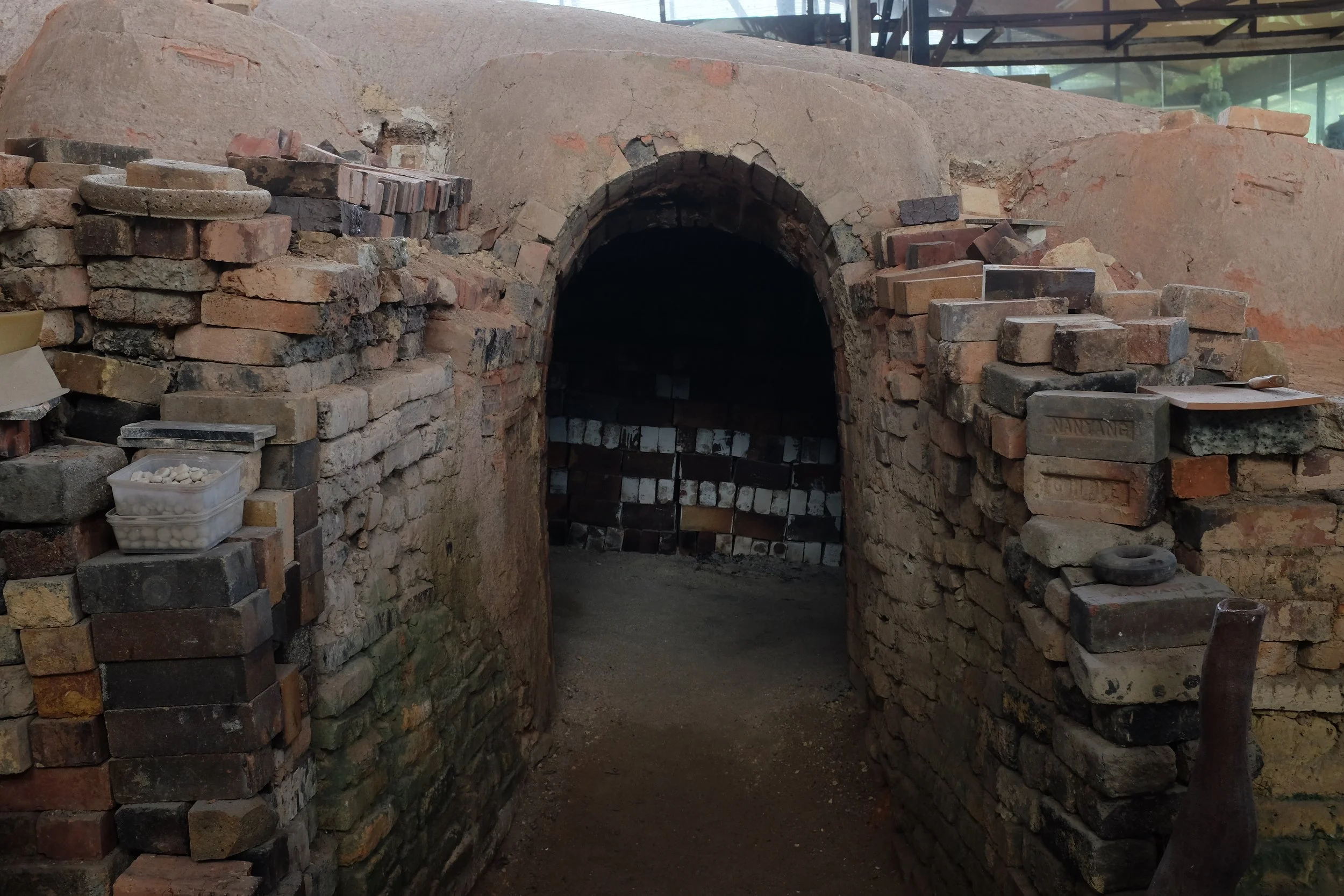 The entrance into the main chamber of the kiln, where pottery pieces are placed. SOURCE: JNZL