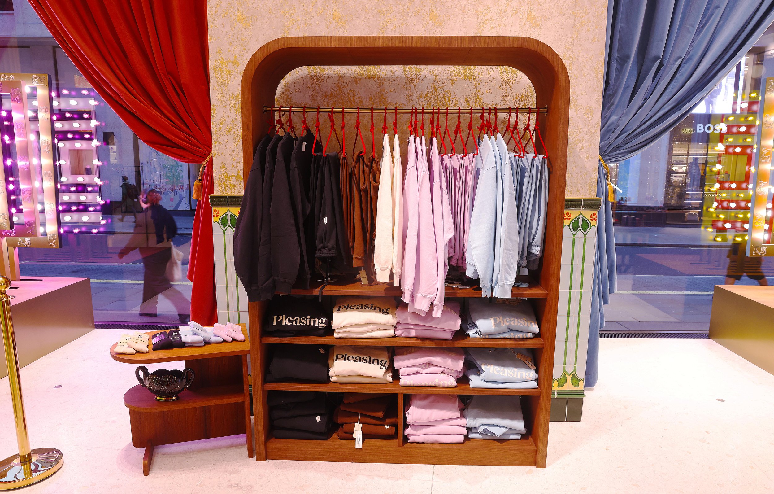 Harry Styles' PLEASING x Selfridges Corner Shop clothing unit.