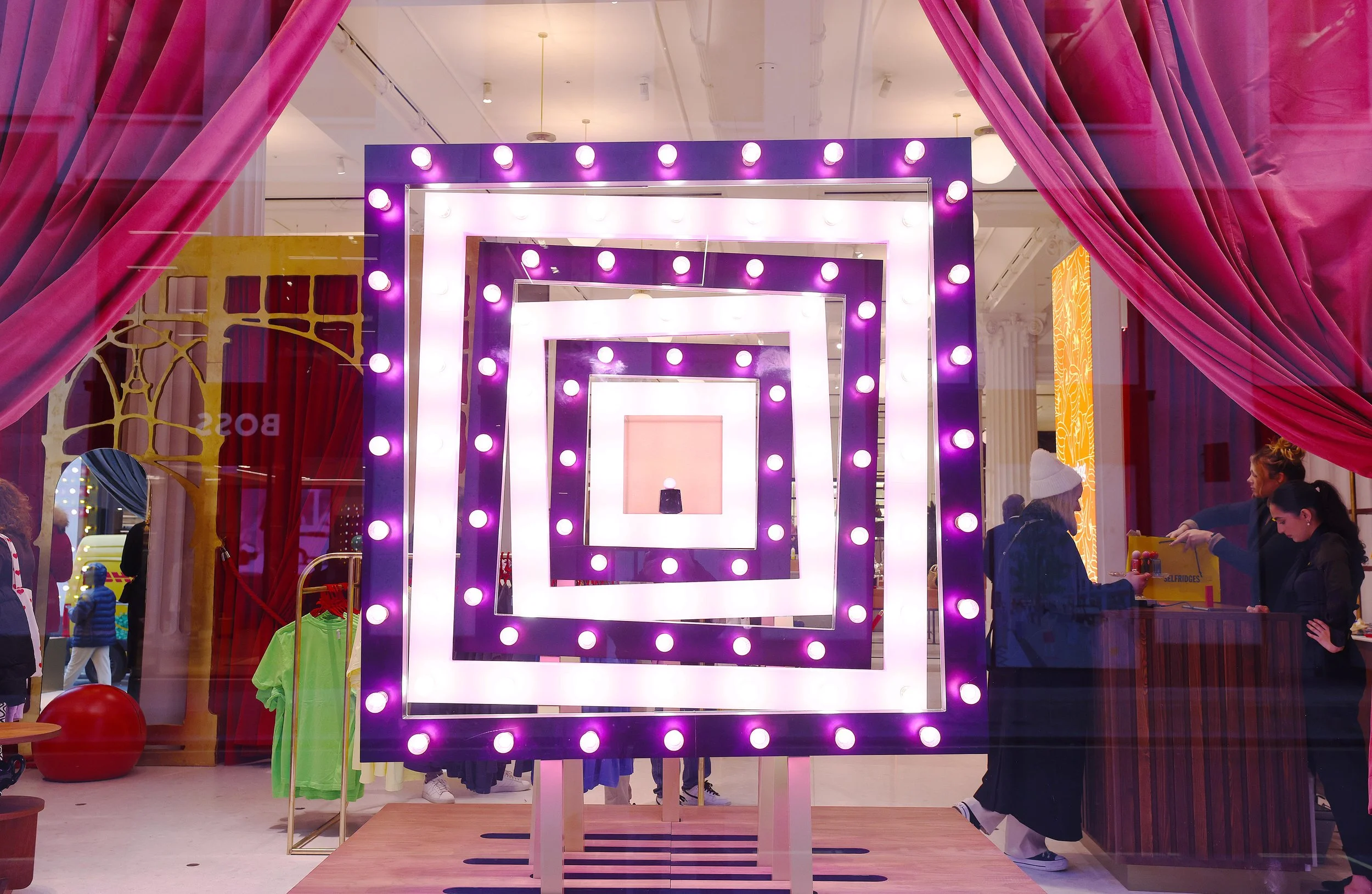 Harry Styles' PLEASING x Selfridges kinetic window displays. 