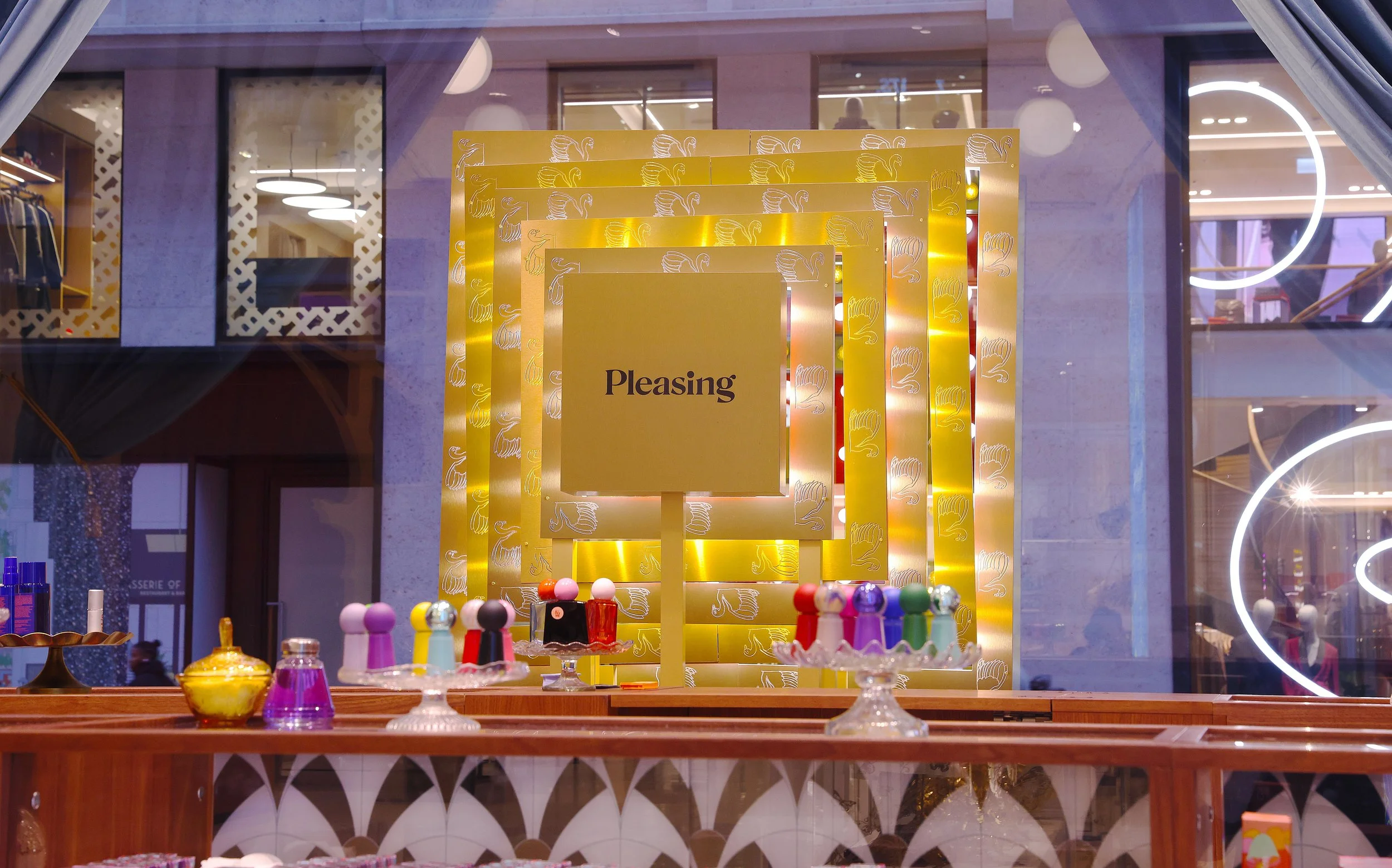 Harry Styles' PLEASING x Selfridges Corner Shop kinetic window display.