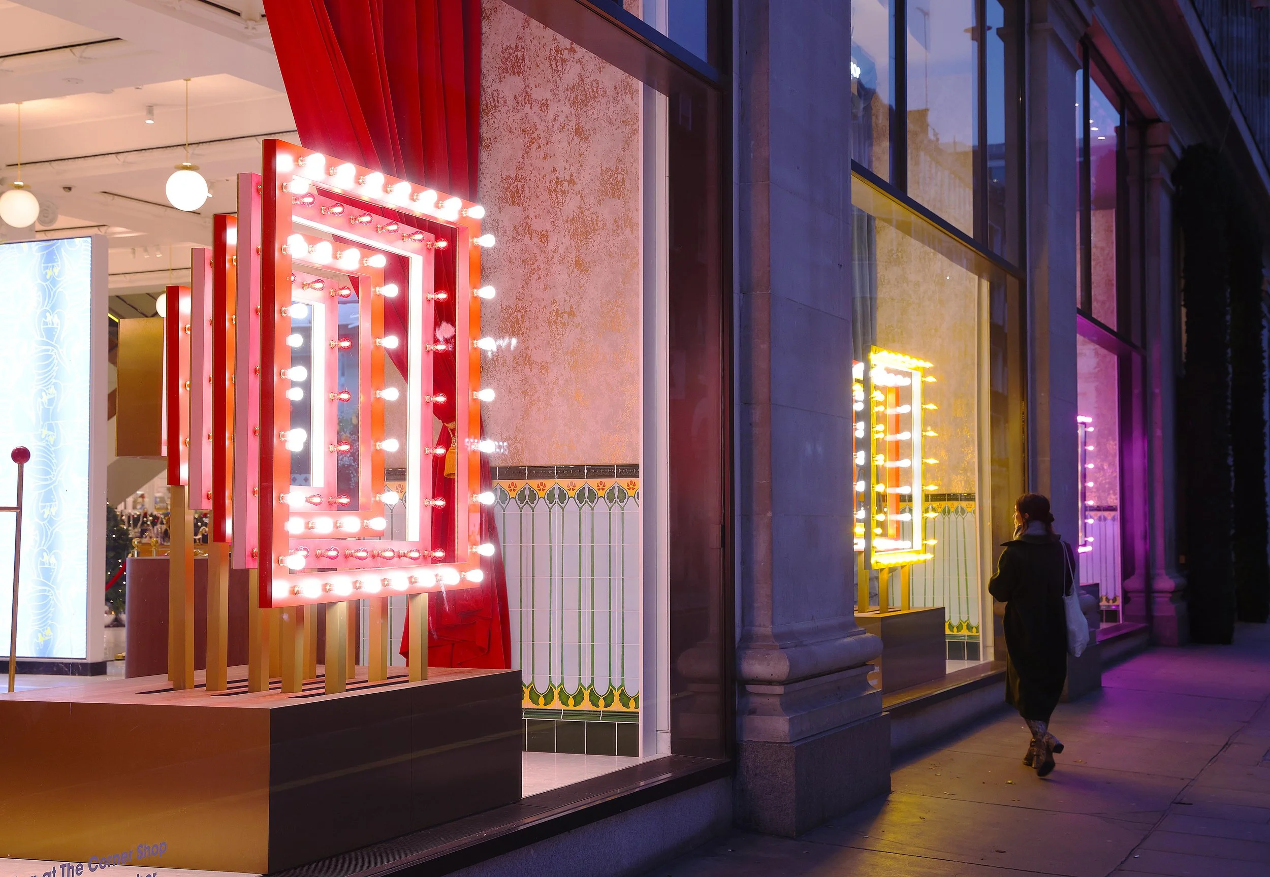 Harry Styles' PLEASING x Selfridges kinetic window displays. 