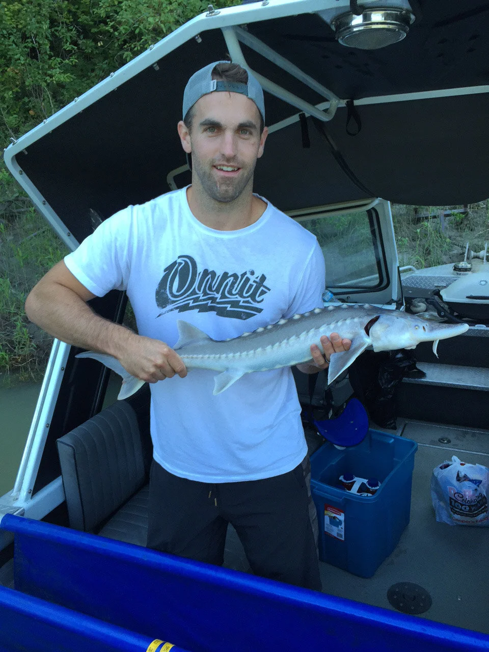 Andrew-Ladd-Catching Sturgeon.jpeg