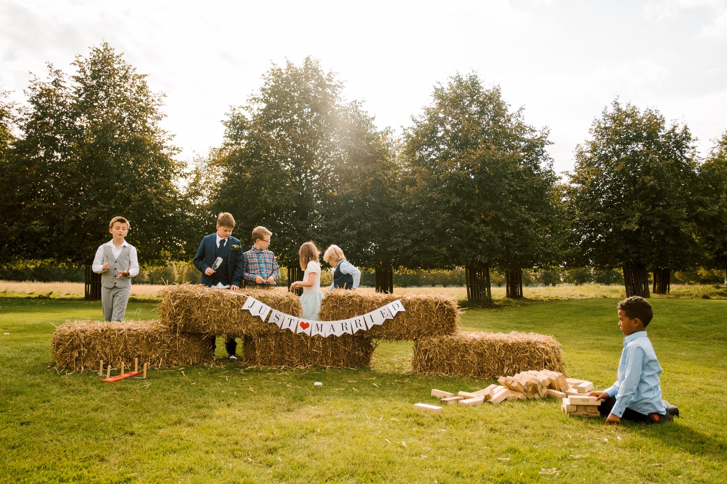 Children playing on the grounds at a wedding at Hampton Court Golf Club