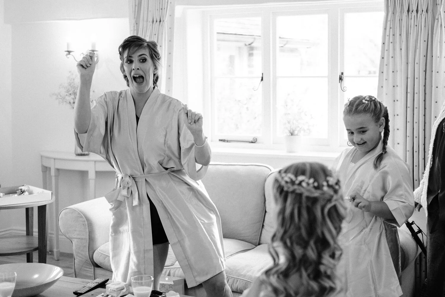 Bridesmaids having fun during Surrey wedding