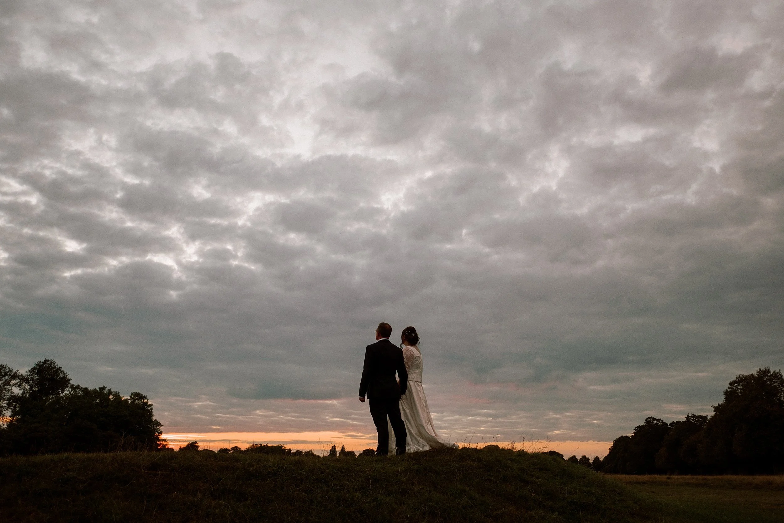 Wedding photo of couple on the grounds of Hampton Court Palace Golf Club