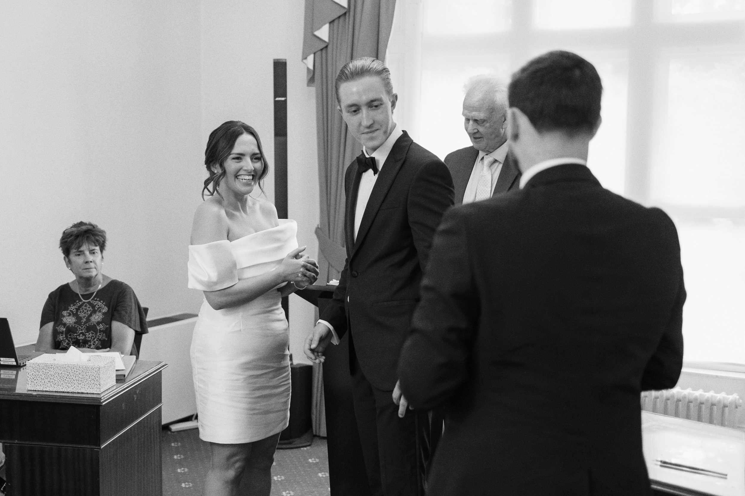 Groom looks at best man