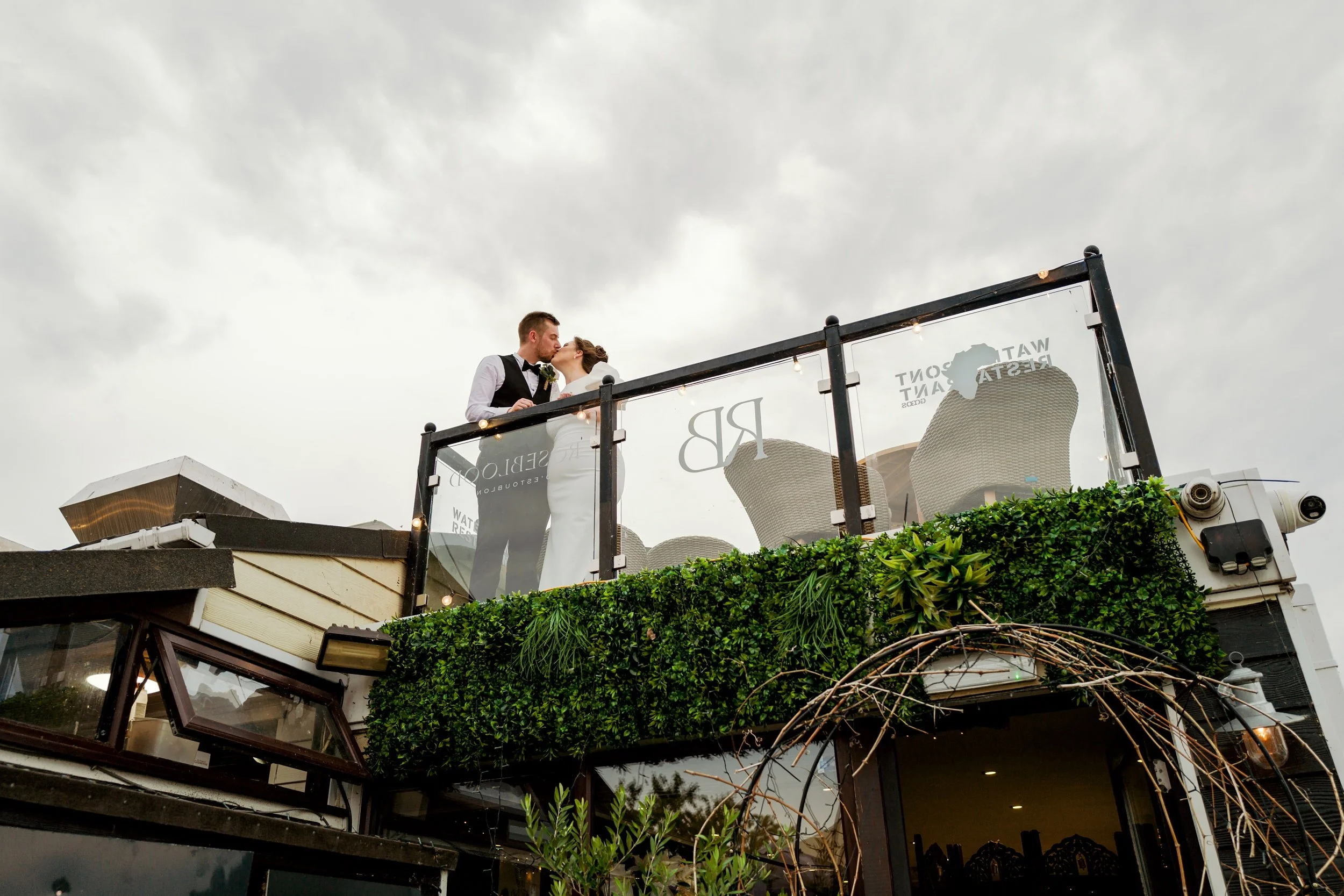 Surrey wedding photographer captures couple outside wedding venue