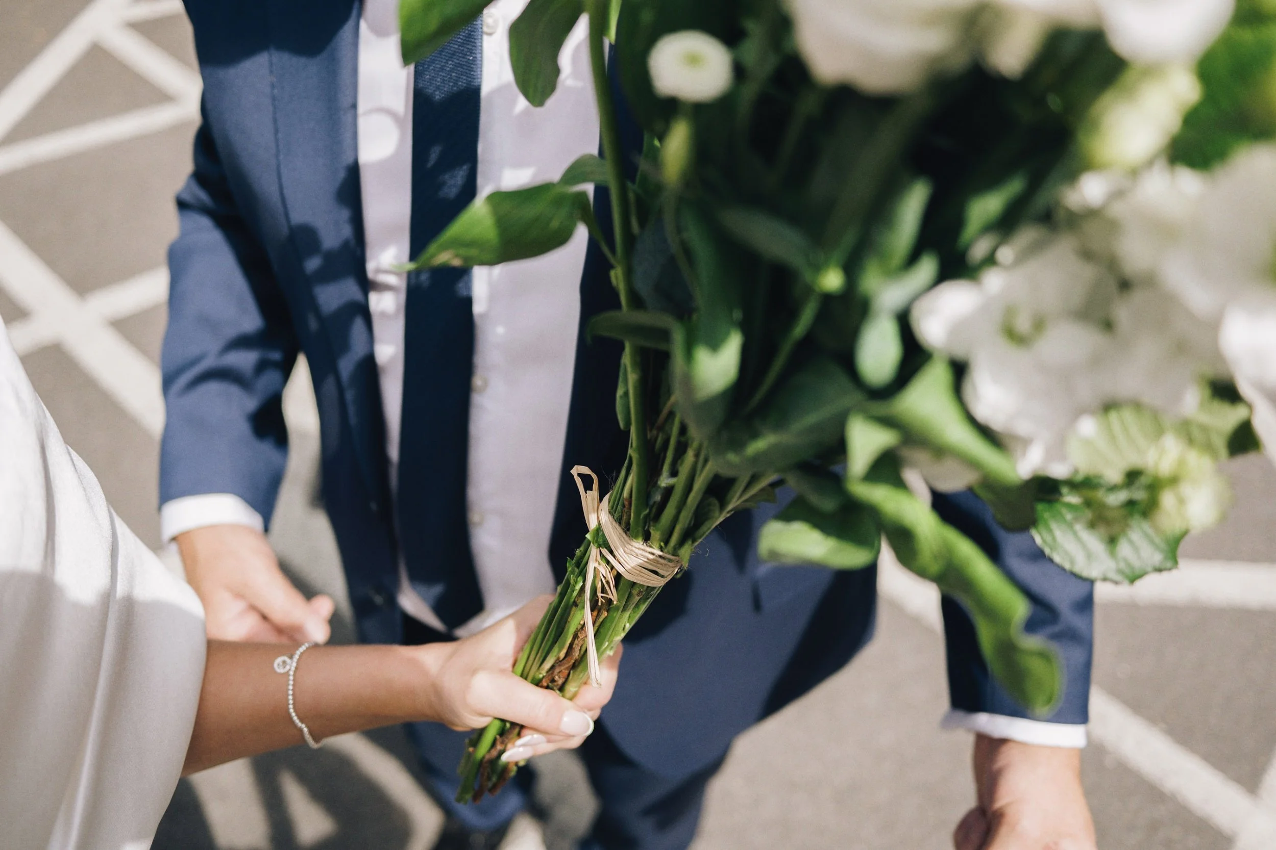 Bride holding her bouquet before she walks into Guildford Register Office