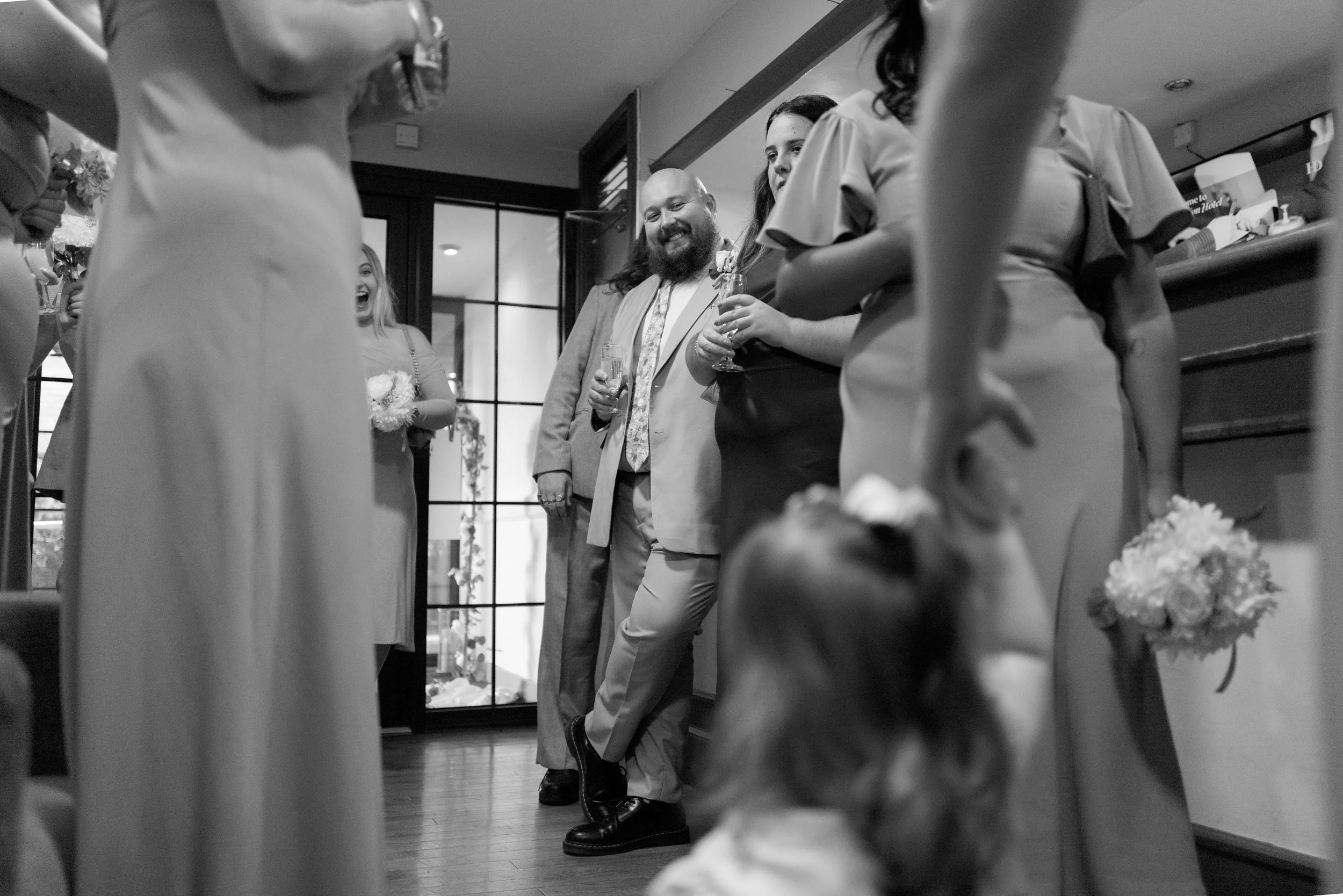 Surrey wedding photographer captures guests at wedding venue