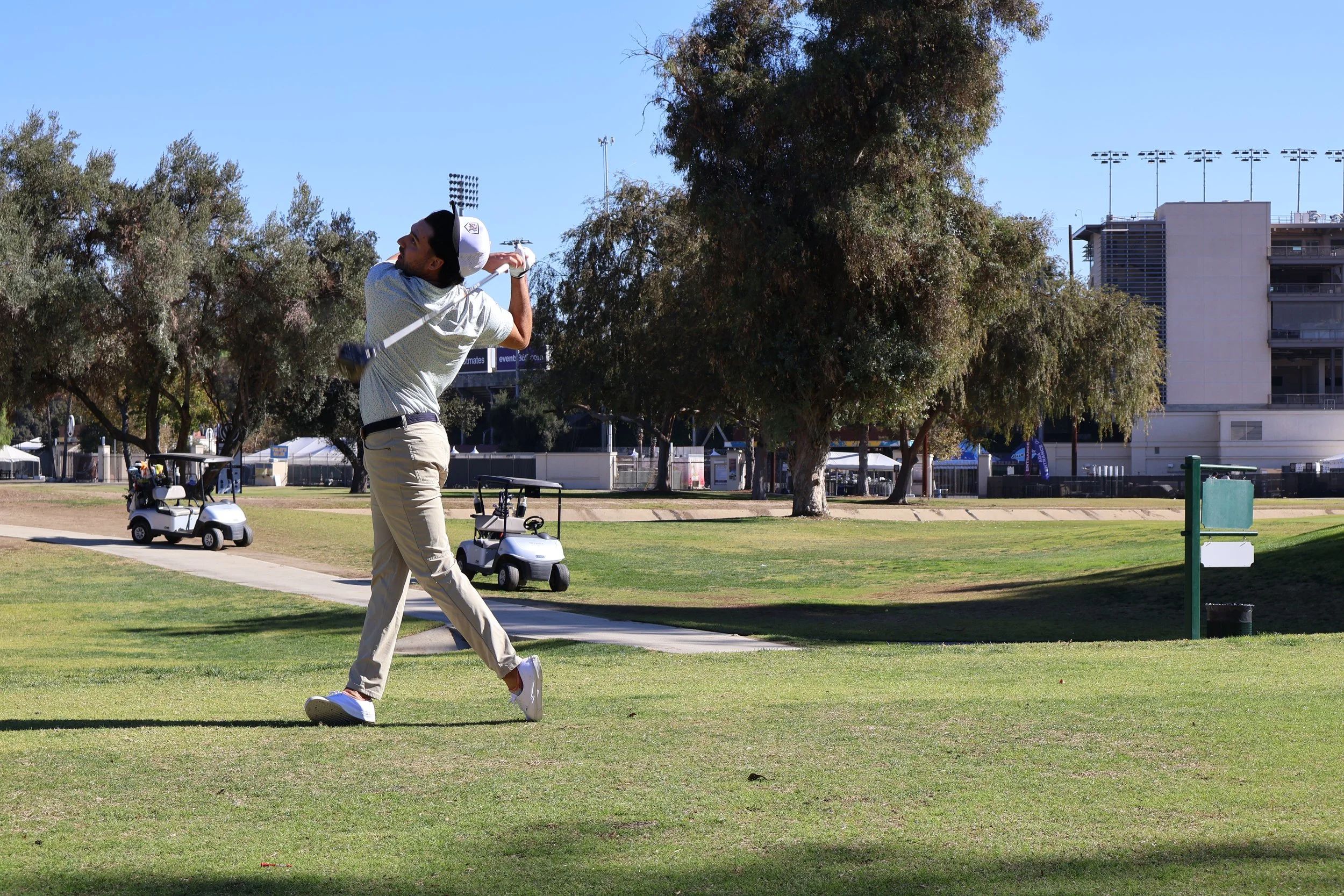 Pro Mike Lowe_backward swing through_hats off.JPG