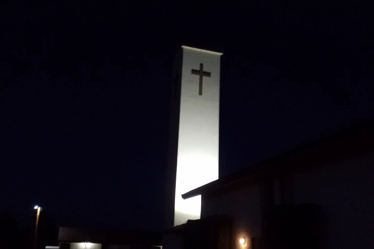 MTE Electric's electrician installed LED flood light to light the cross at this Apple Valley church.